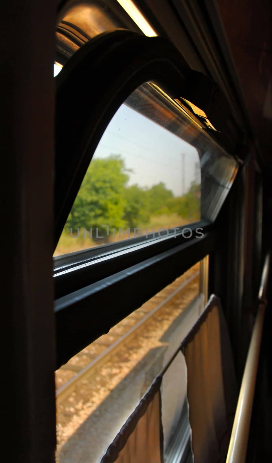 window with curtain inside of train wagon