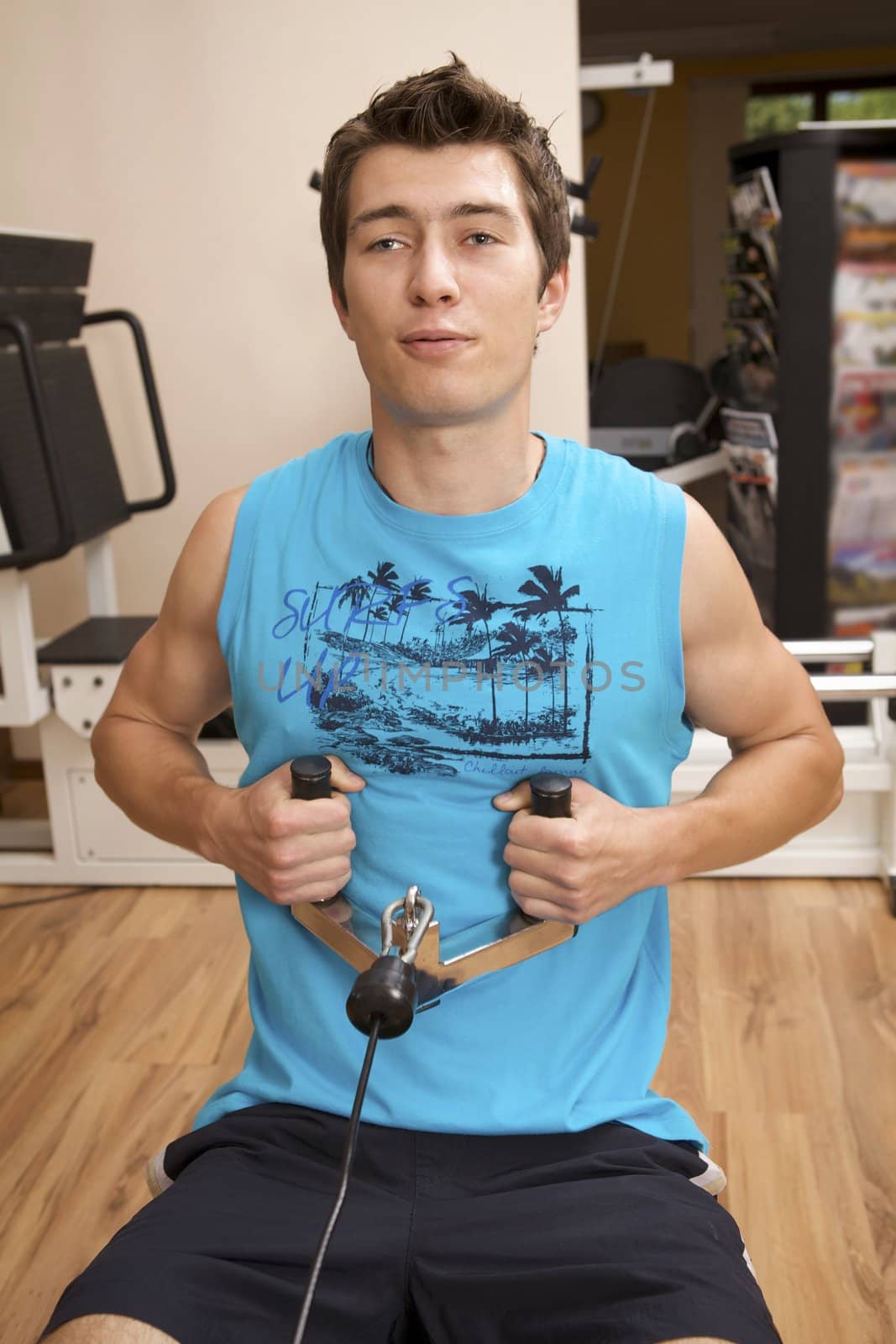 Man Weight Training At Gym by krzysiek_z_poczty
