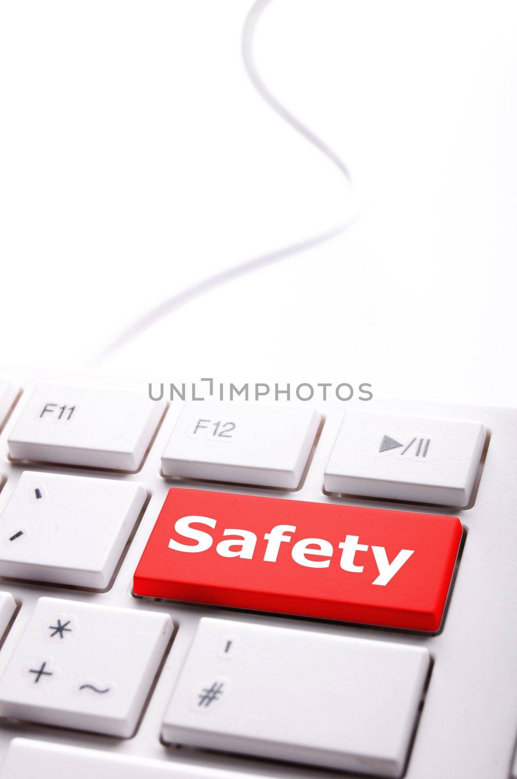 safety first on computer key showing security concept