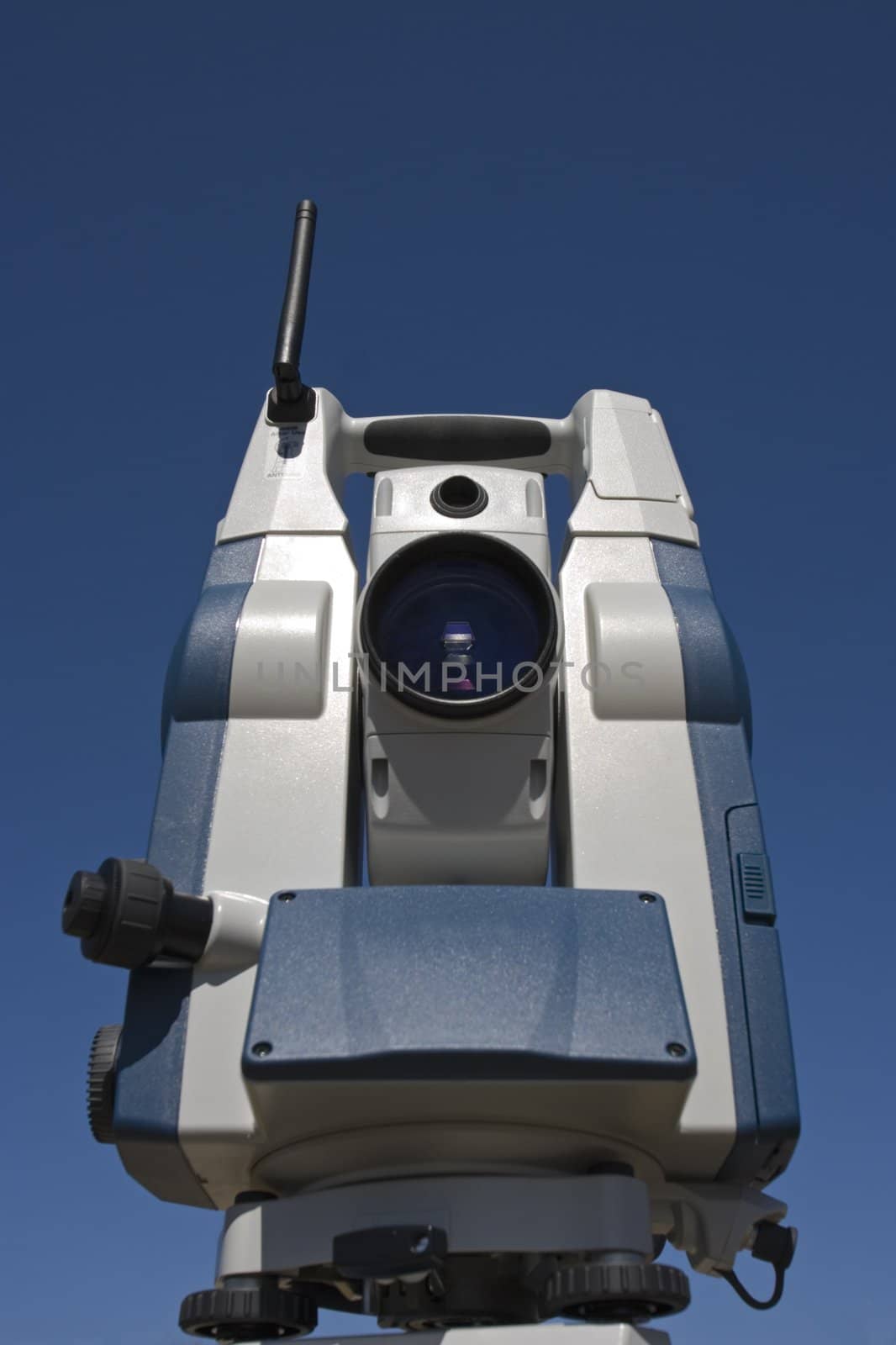 Theodolite with blue sky as a background.