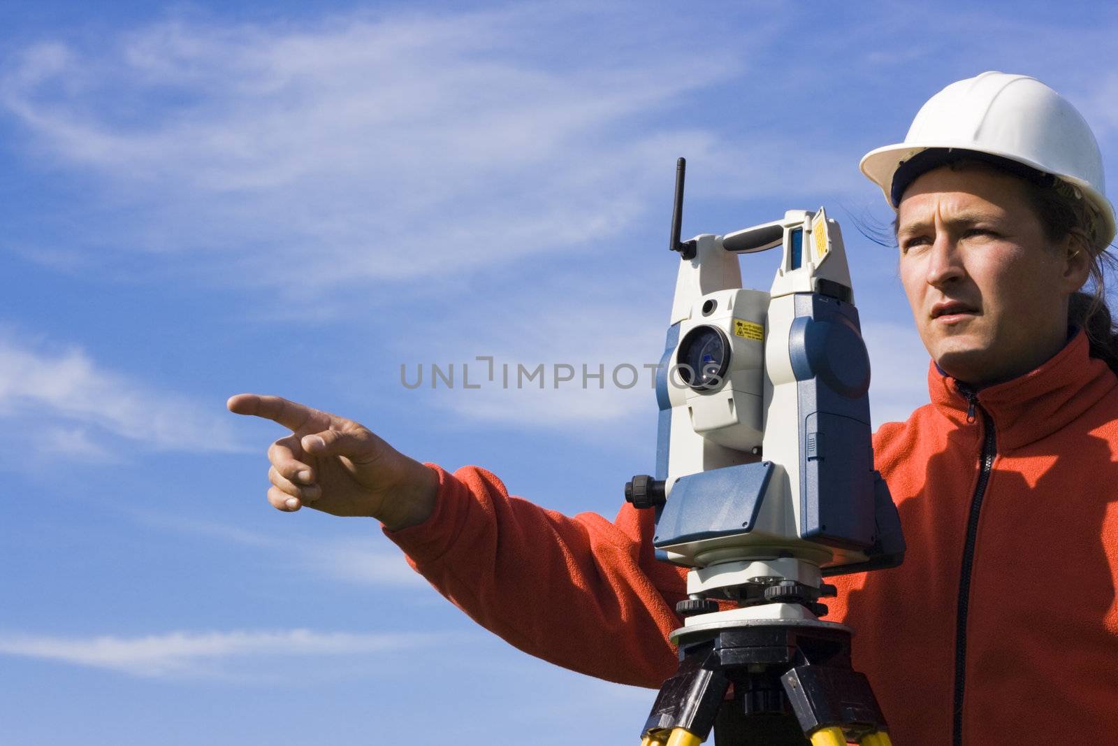 Land Surveyor in the field - spring surveying.