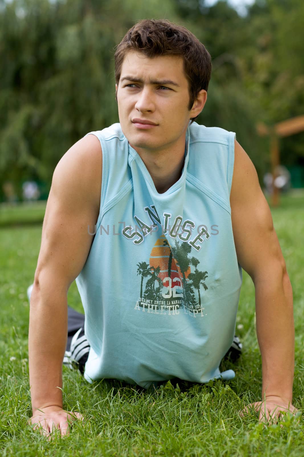 Young man exercising in park