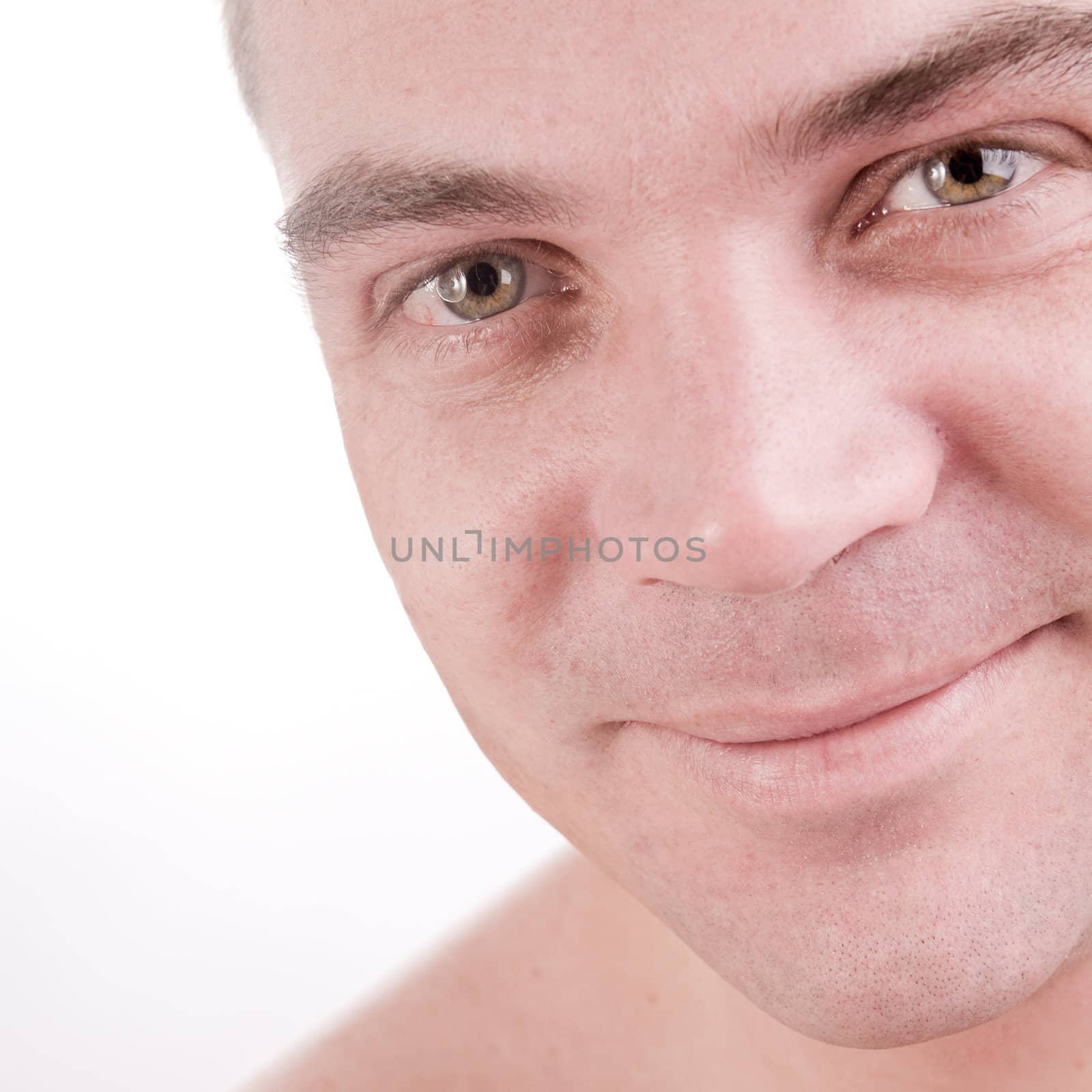 Young man portrait in the studio on a white background
