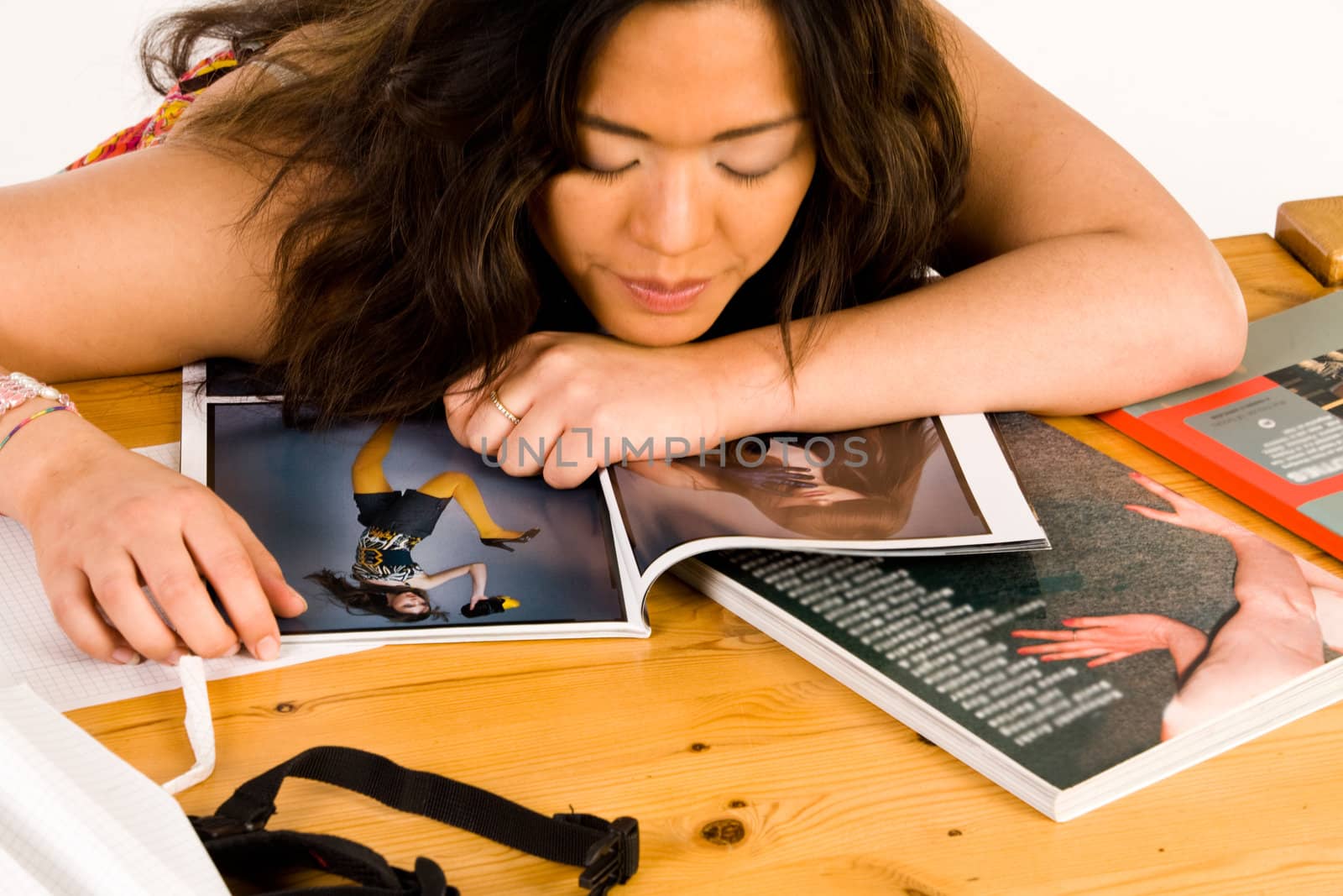 Student is sleeping on her books by DNFStyle