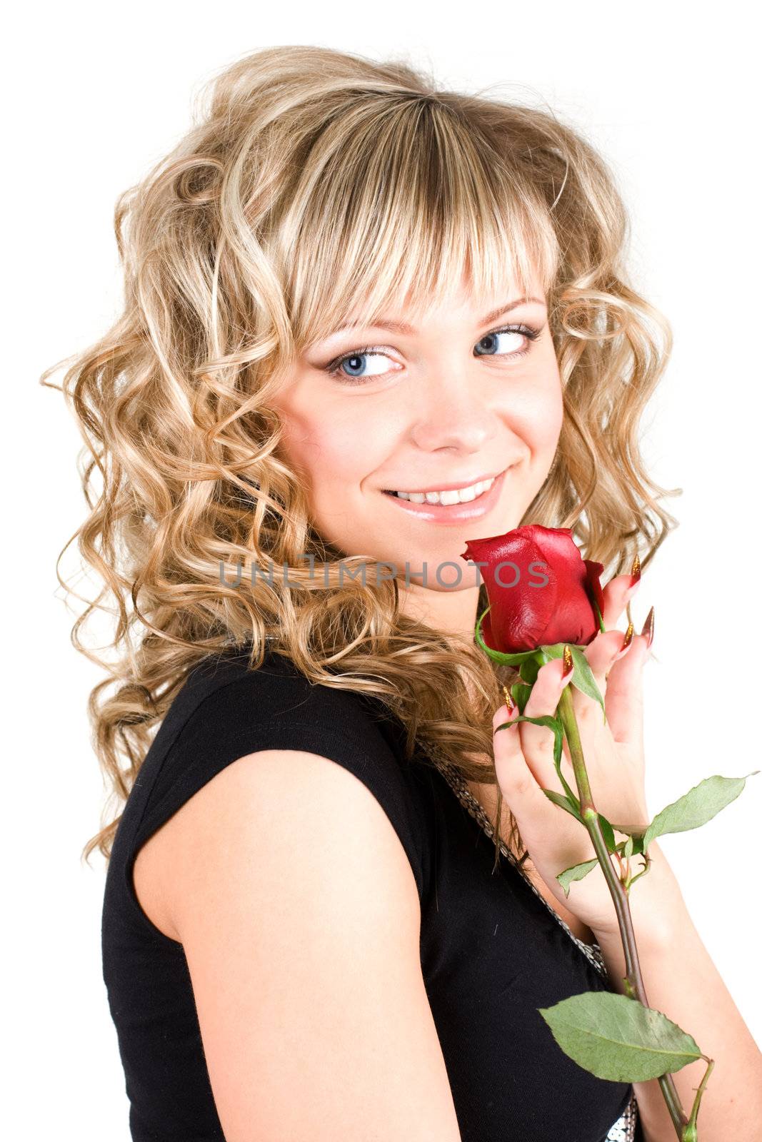 Close-up of the young blond girl face with a rose
