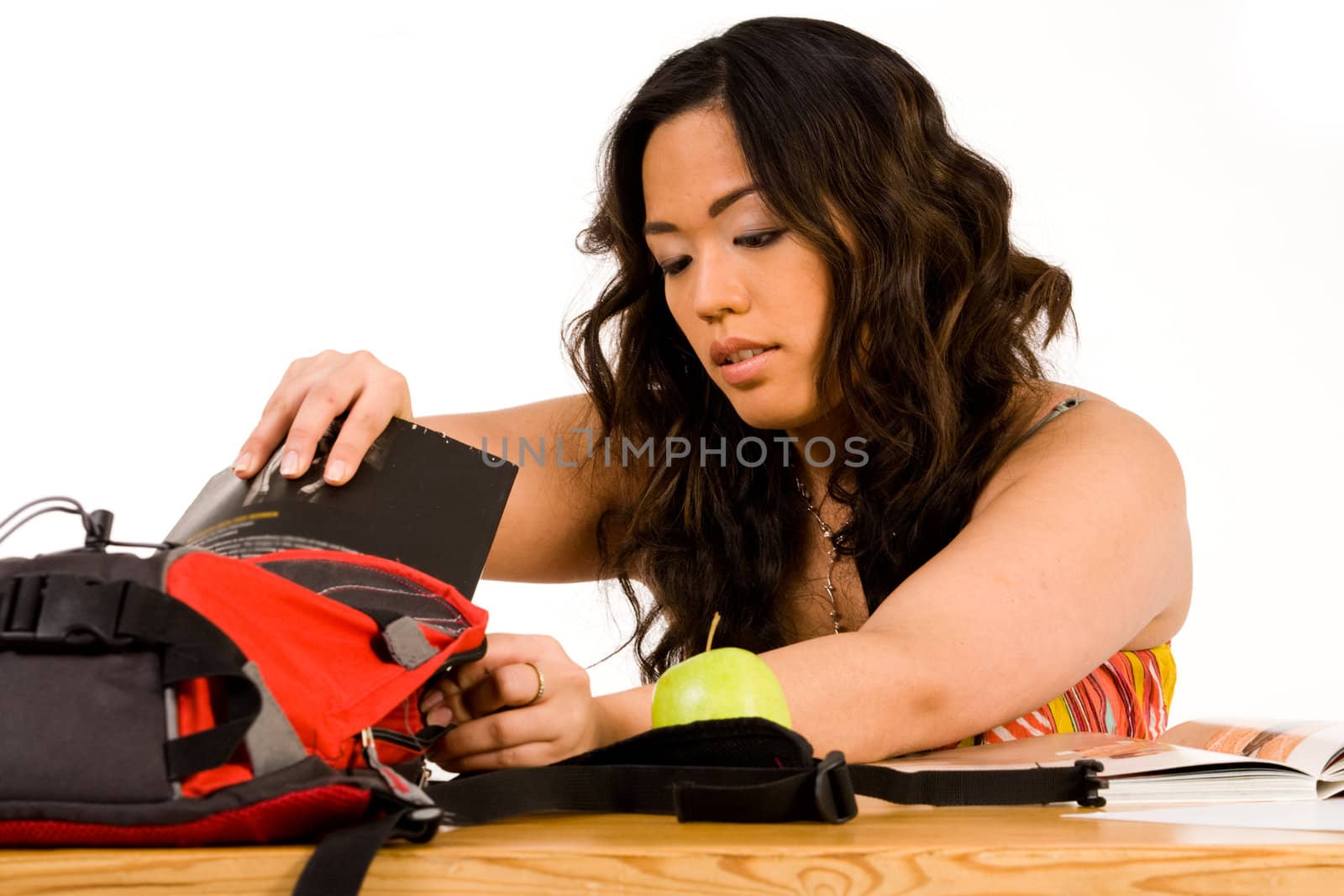 Sexy school girl learning for her exam