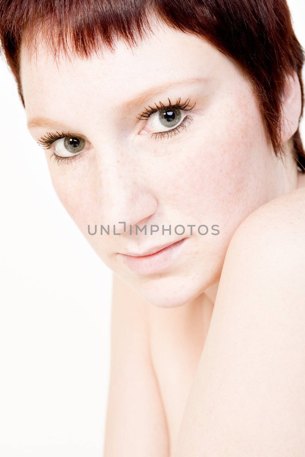 Studio portrait of a mesmerizing young woman with short hair  by DNFStyle