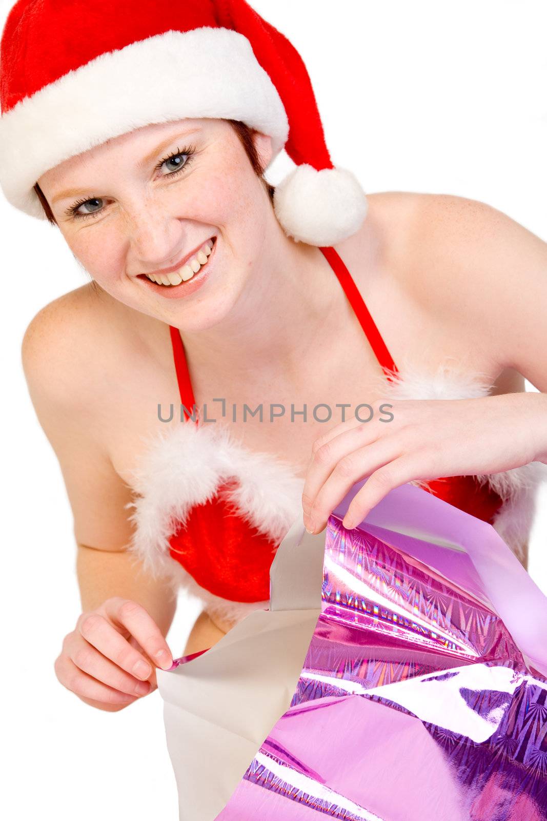 portrait of a beautifull girl dressed up for christmas.
File has a clipping path for your covenience.