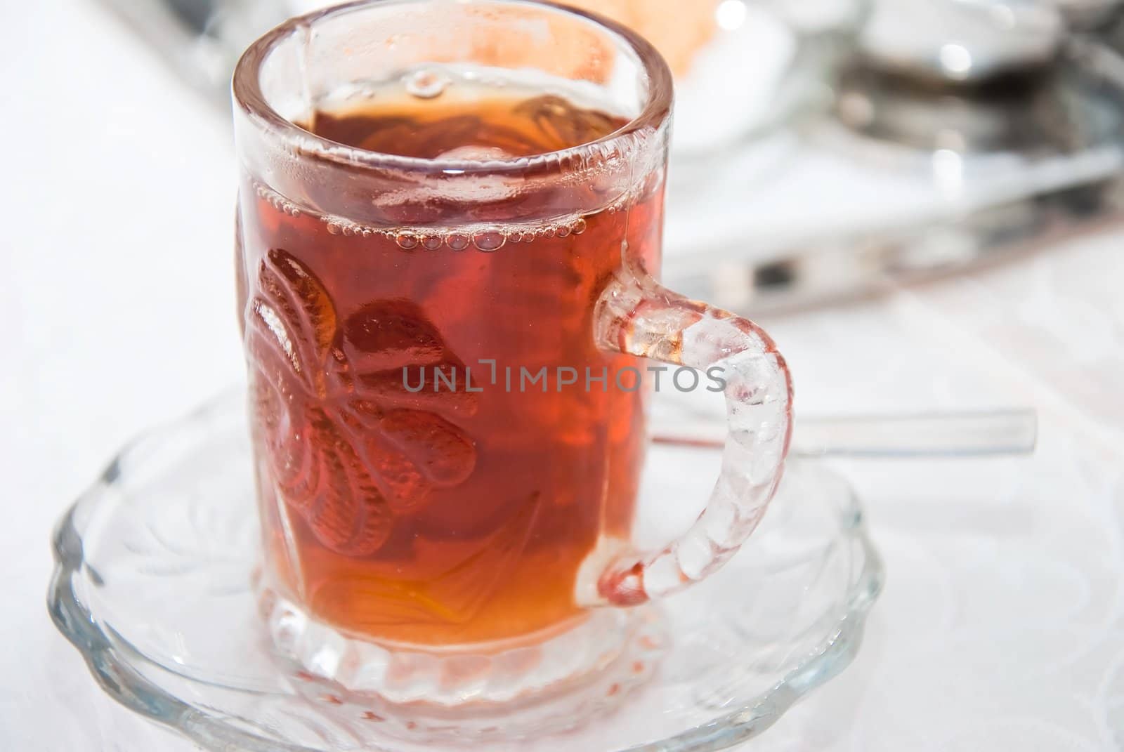 Hot black tead in glass cup