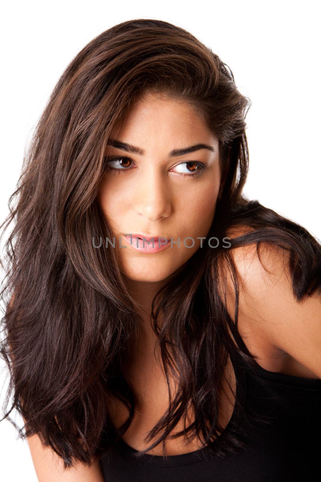 Face of beautiful brunette woman looking to side with clean smooth skin and long brown hair, isolated.