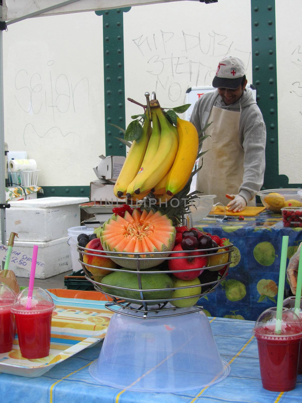 Unidentified man at juice stall at Brick Lane Market on August 1 by green308