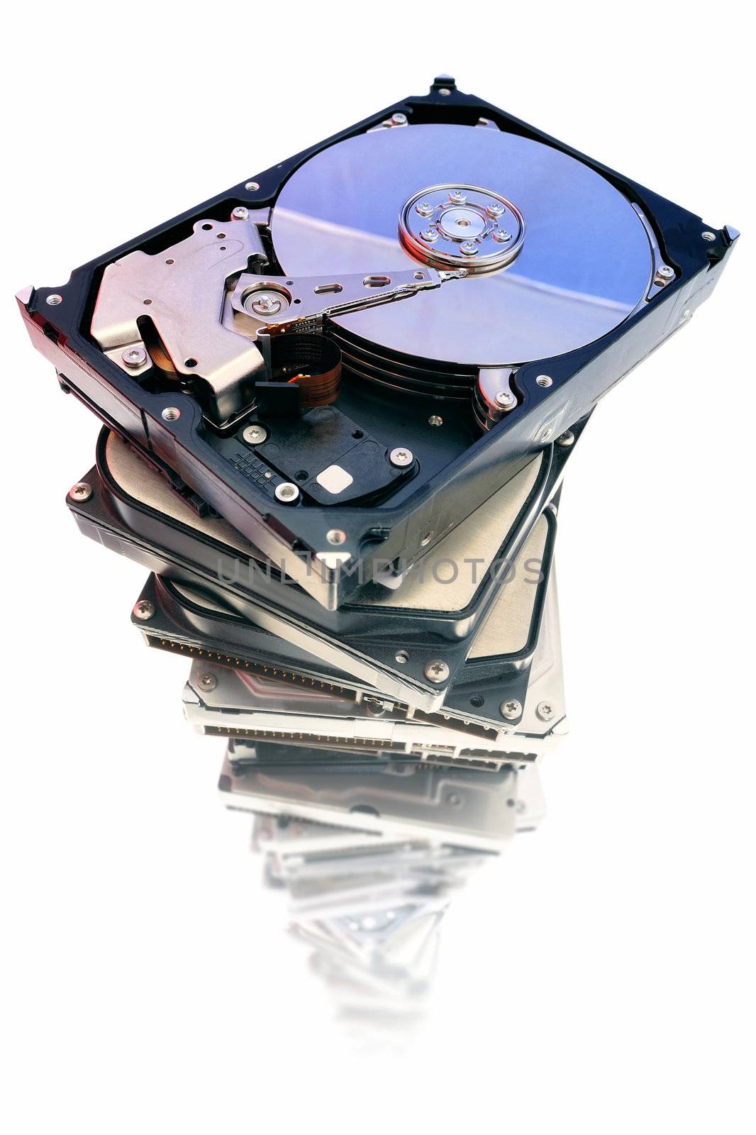 Stack of hard drives on the white background