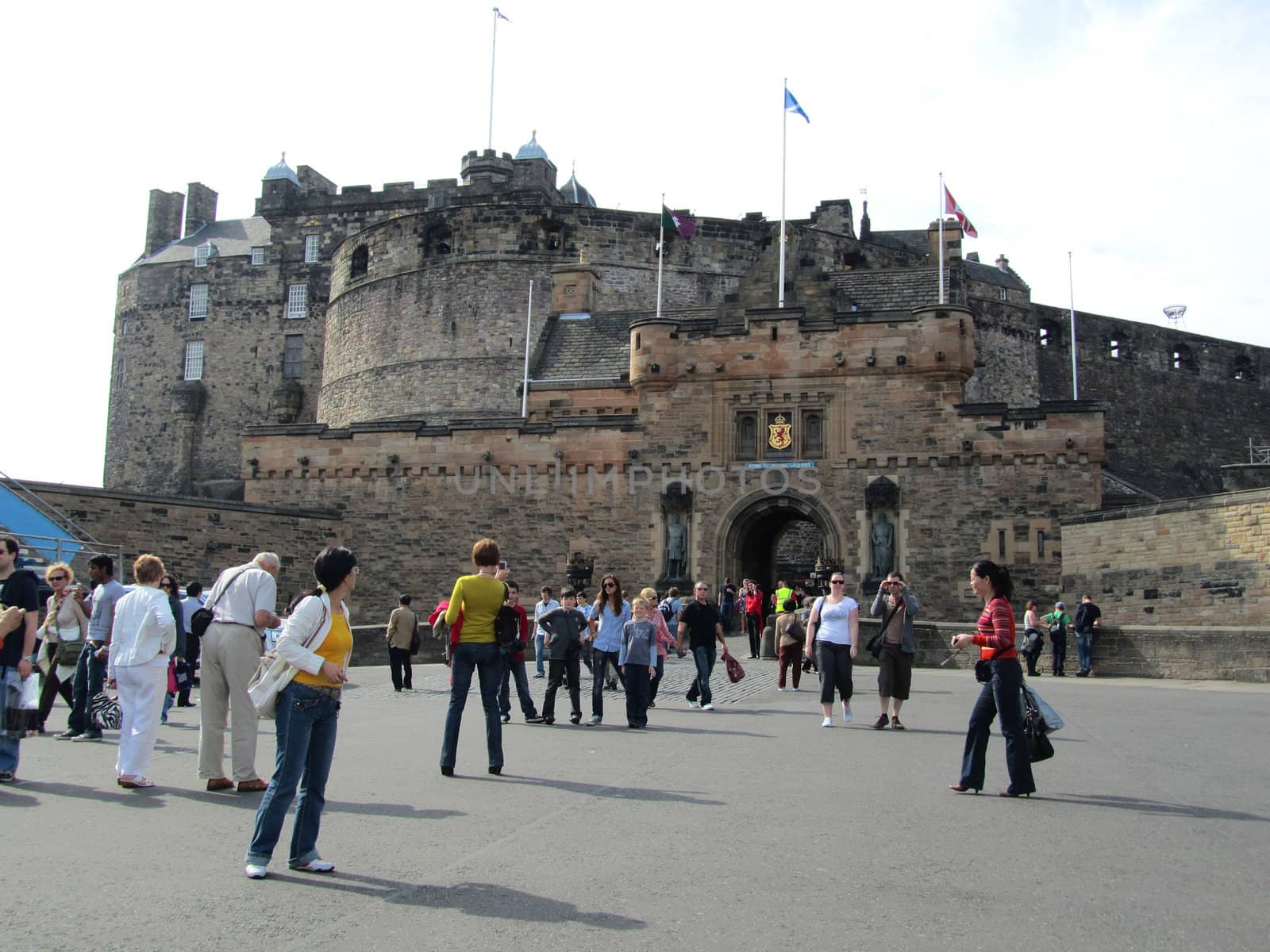 EDINBURGH, SCOTLAND - SEPTEMBER 4: Unidentified visitors at Edinburgh Castle September 4, 2010 in Edinburgh. Edinburgh Castle is the No. 1 tourist attraction in Scotland.