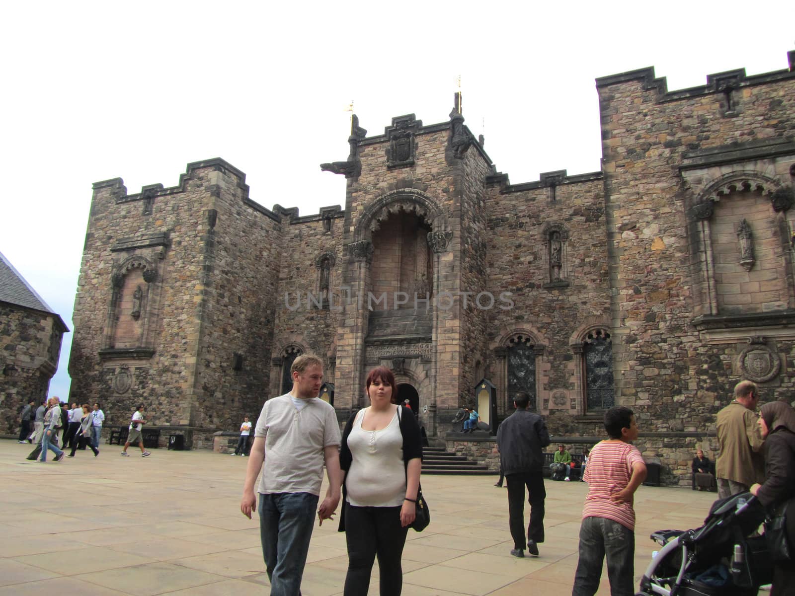 EDINBURGH, SCOTLAND - SEPTEMBER 4: Unidentified visitors at Edinburgh Castle September 4, 2010 in Edinburgh. Edinburgh Castle is the No. 1 tourist attraction in Scotland.