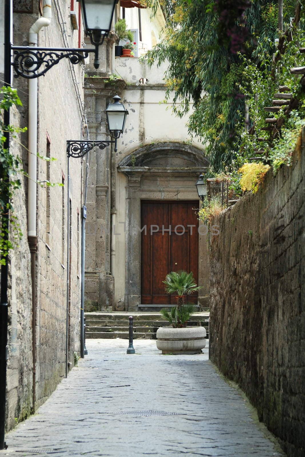 An alleyway with a door in Sorrento, Italy