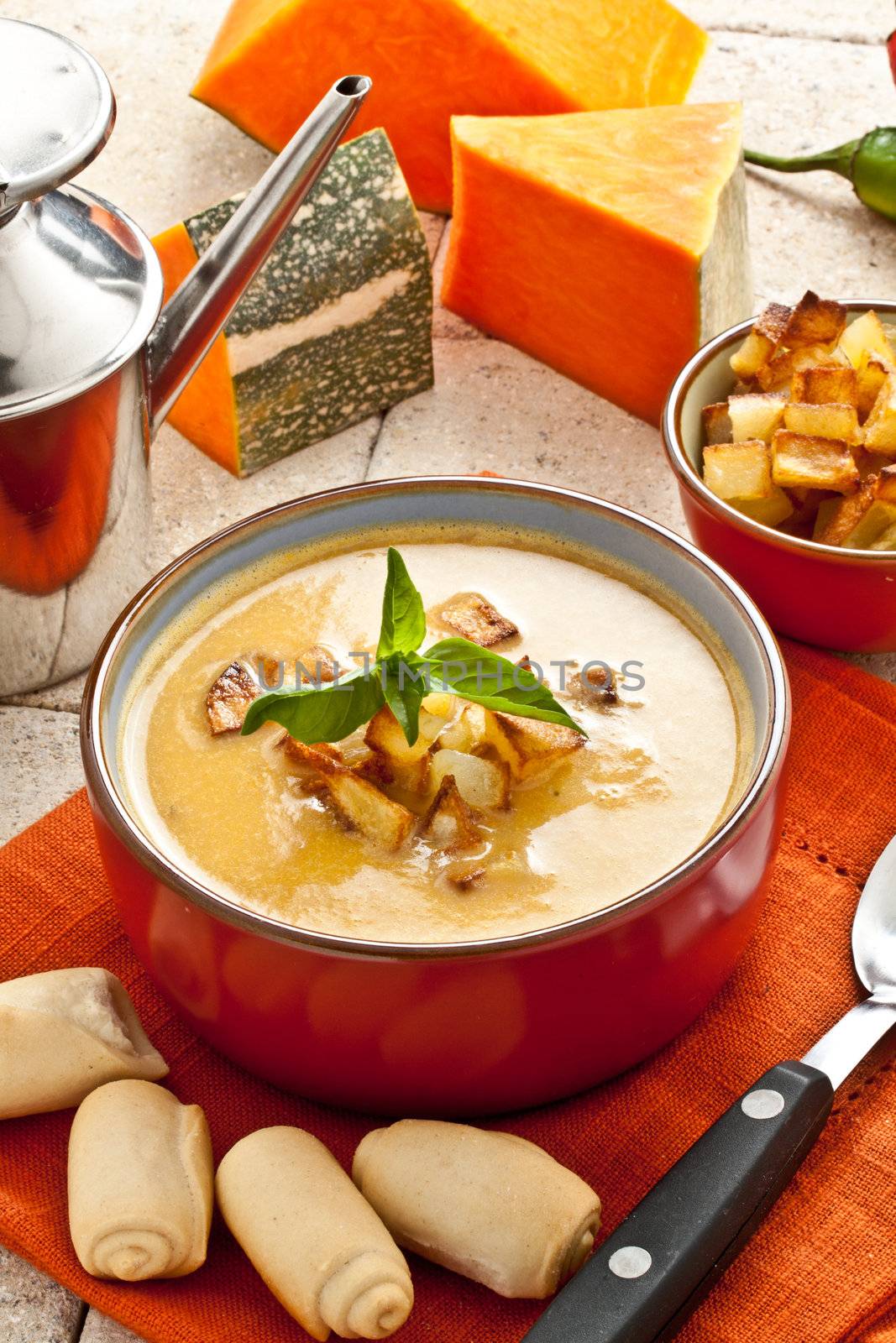 pumpkin soup with fried potato and croutons