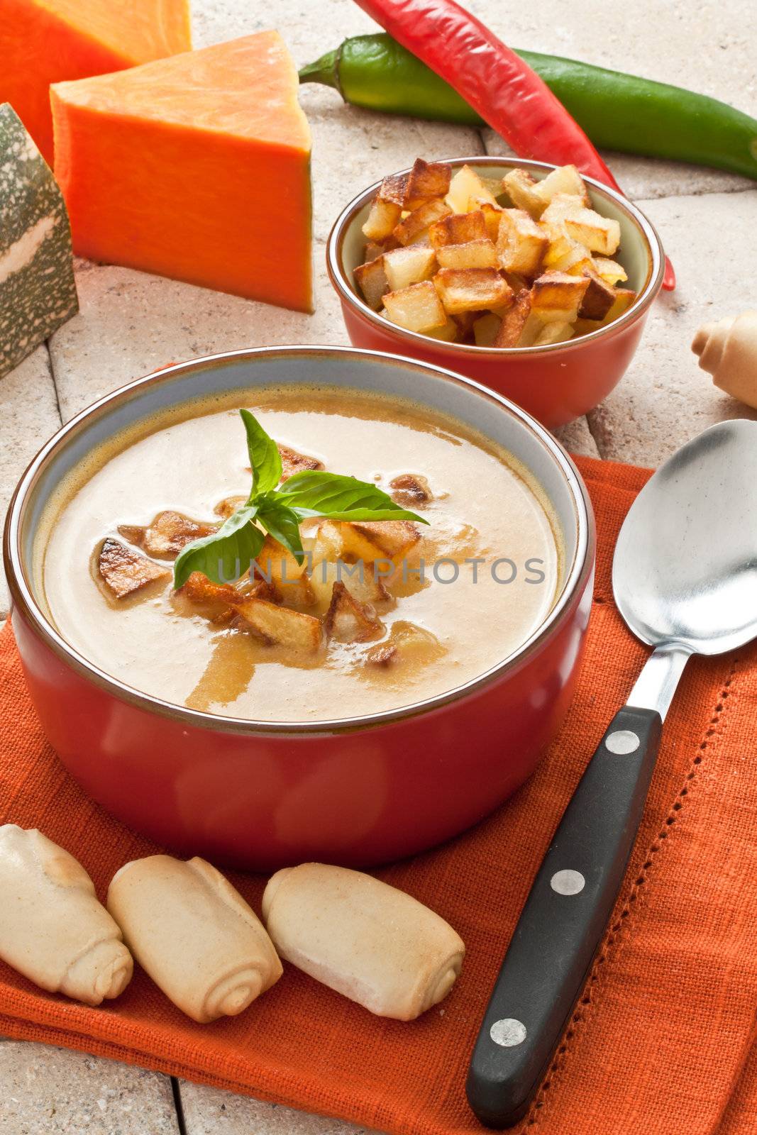 pumpkin soup with fried potato and croutons