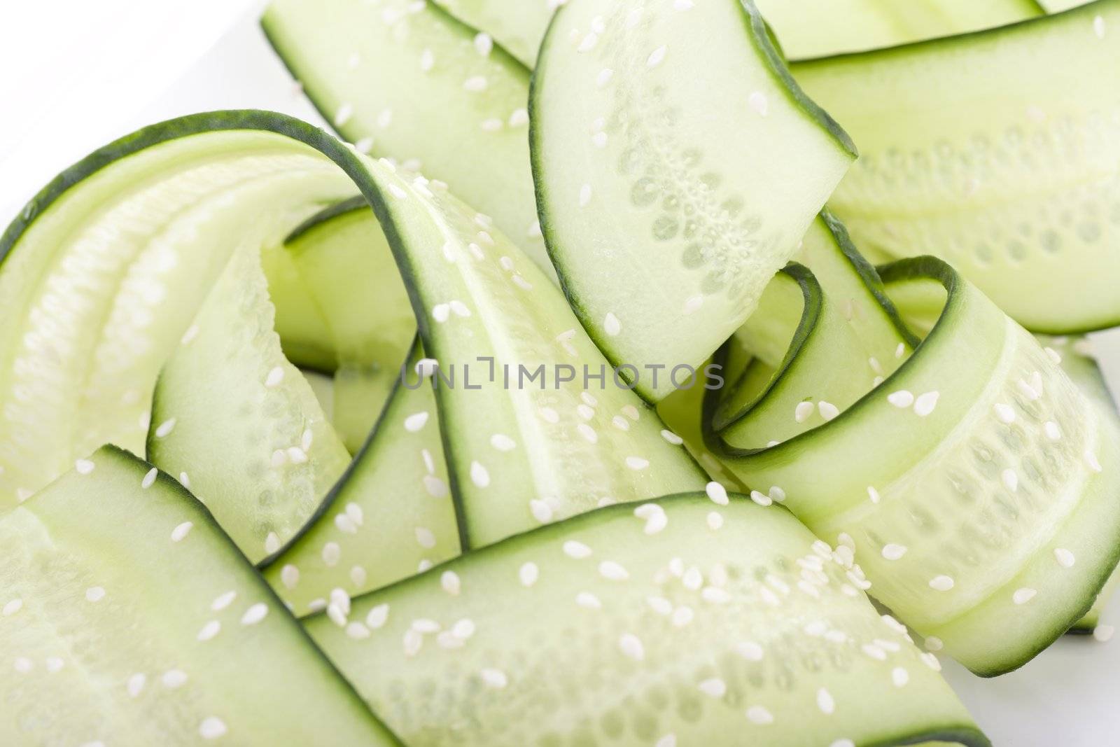 Japanese cucumber salad with rice vinegar and sesame seeds.