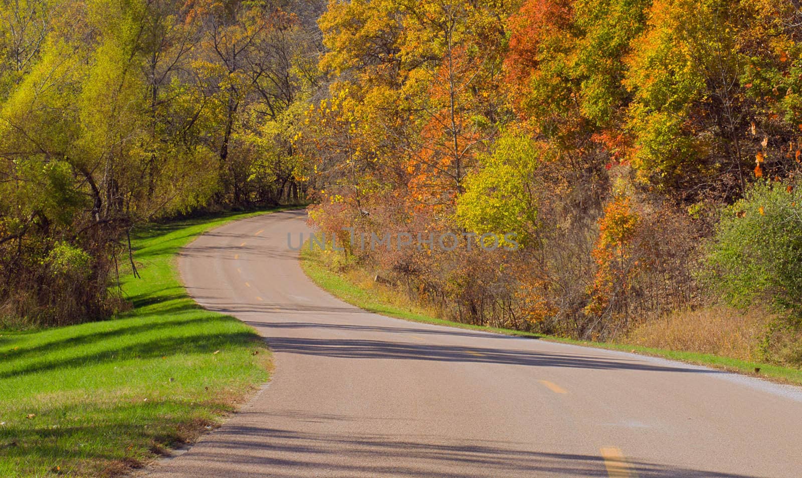 Curving road and autumn woods, Indian Cave State Park, Nebraska, USA by CharlesBolin