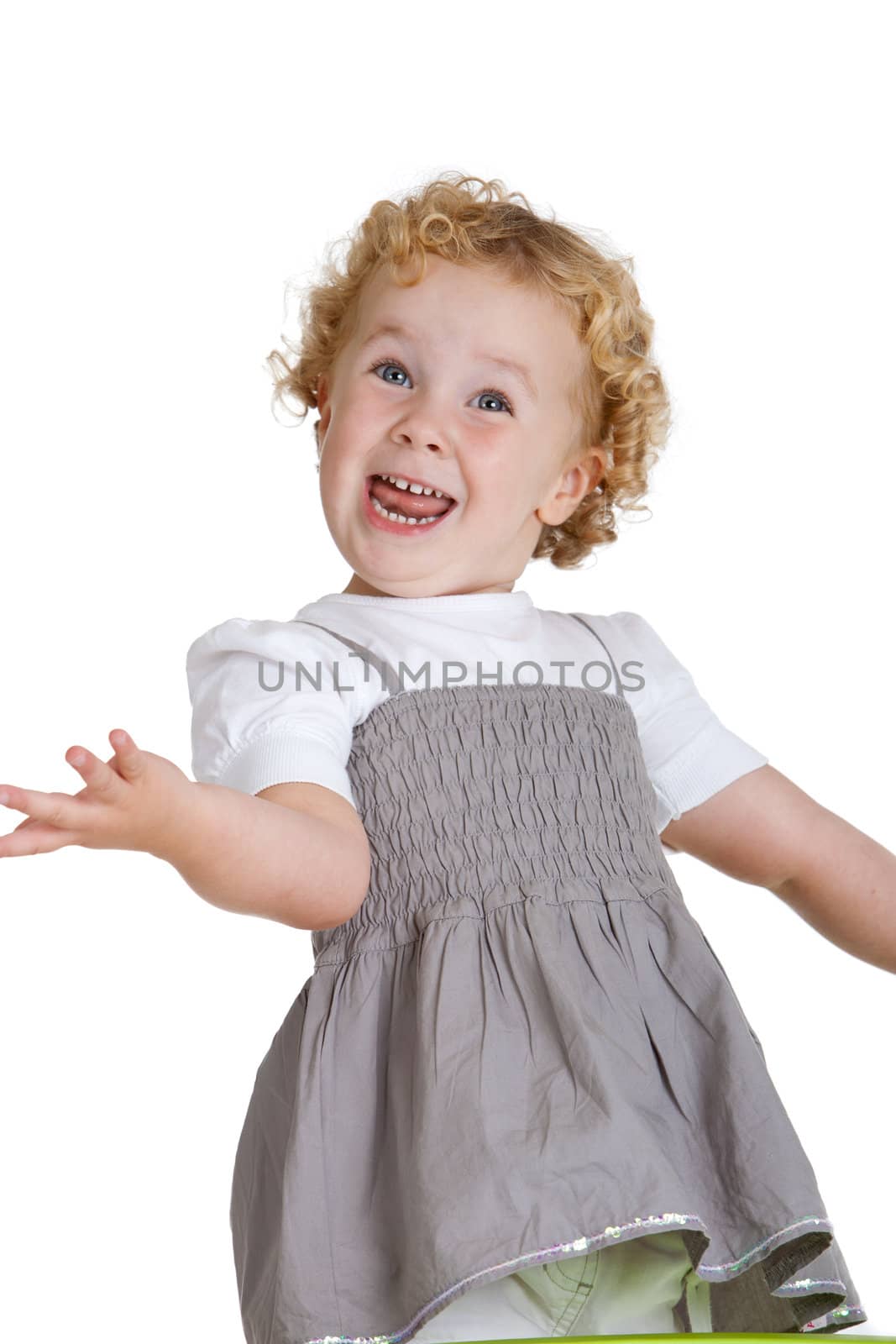 Cute little three year old girl playing the clown and having fun