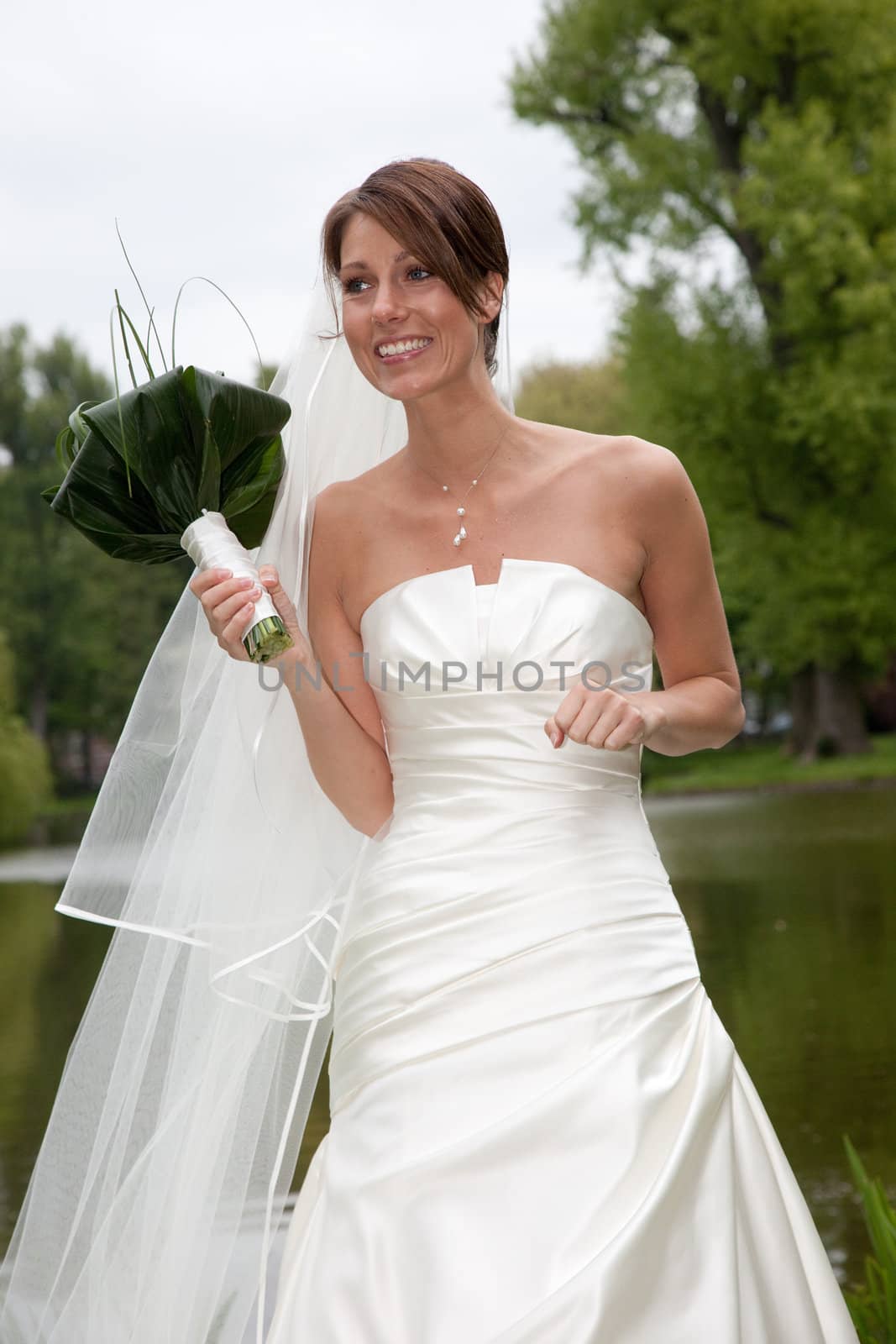 Beautiful bride with big smile looking happy and excited