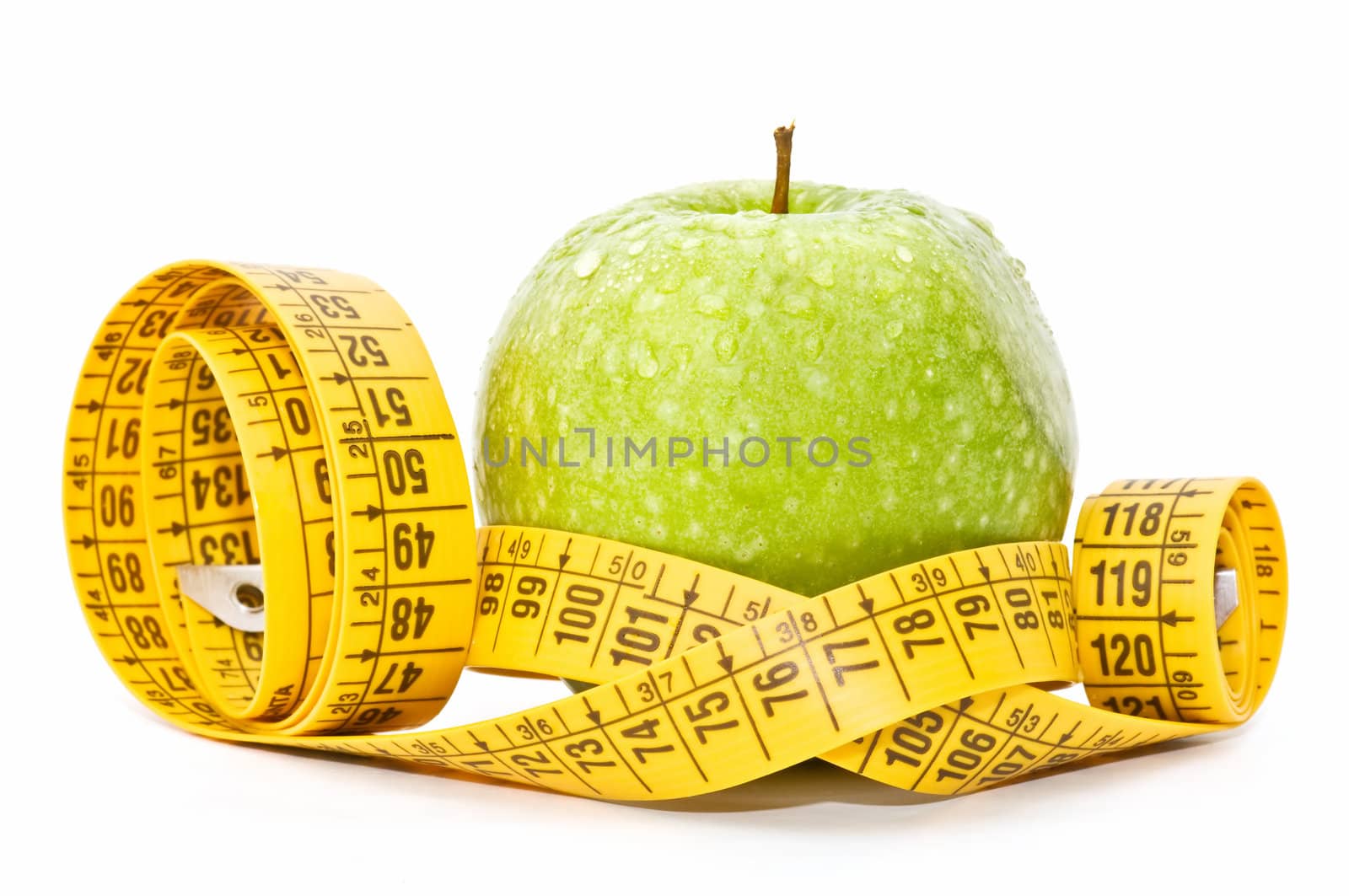 meters and apple on  white background
