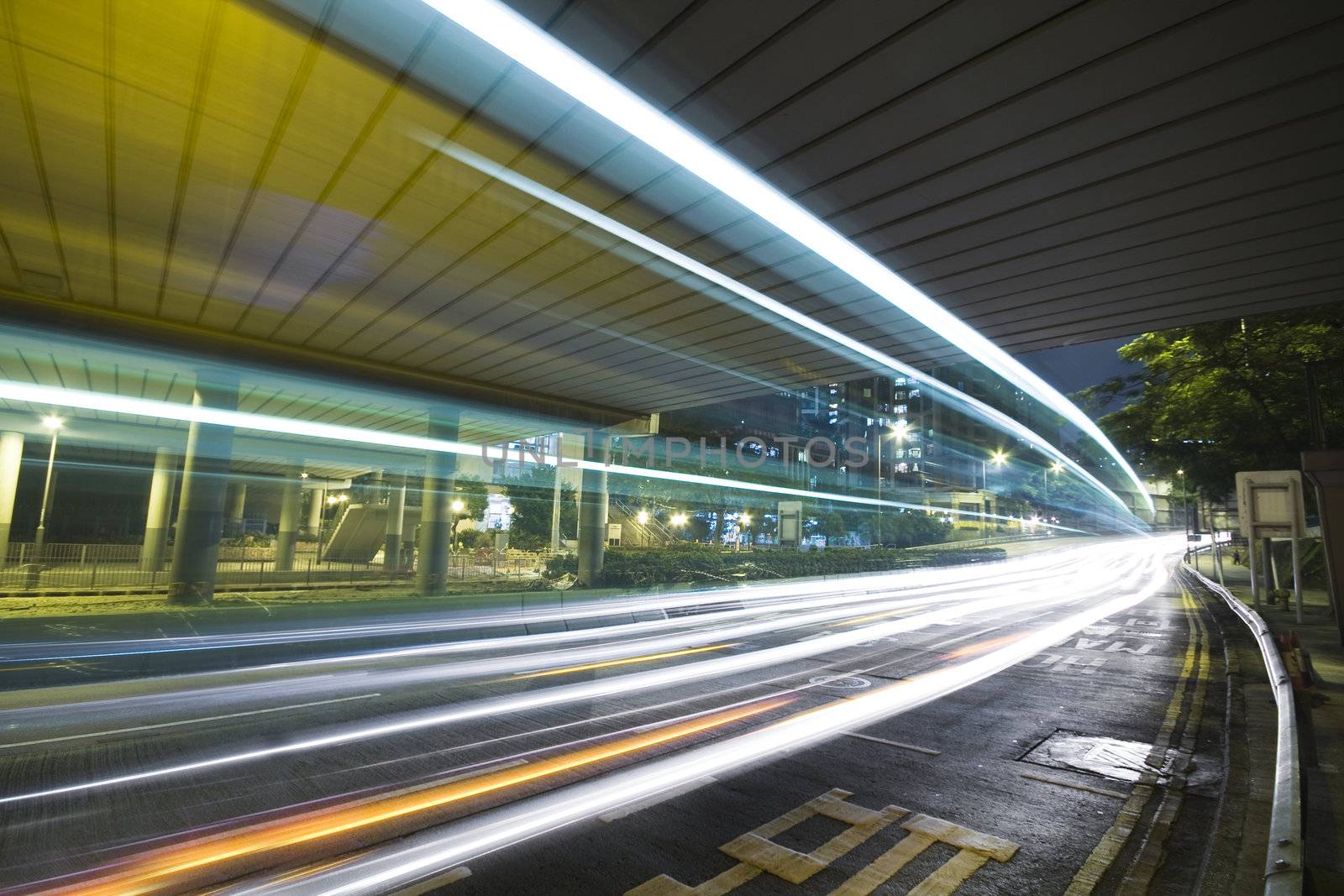 traffic in city at night in hong kong