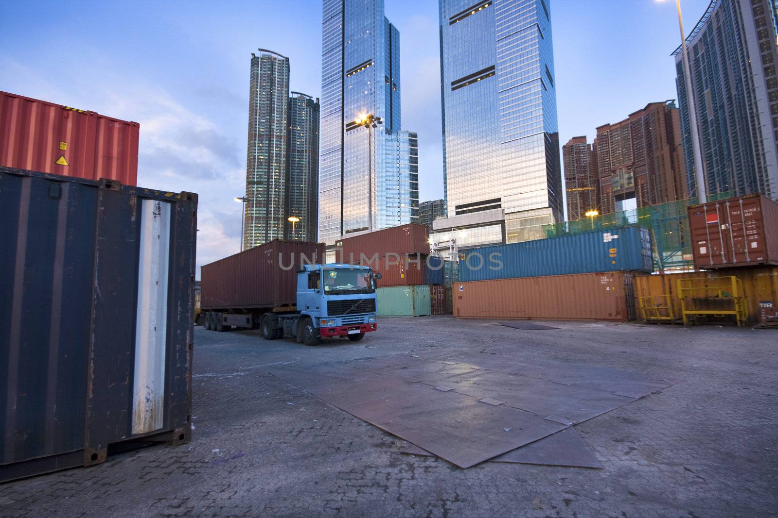 container site before modern building in city