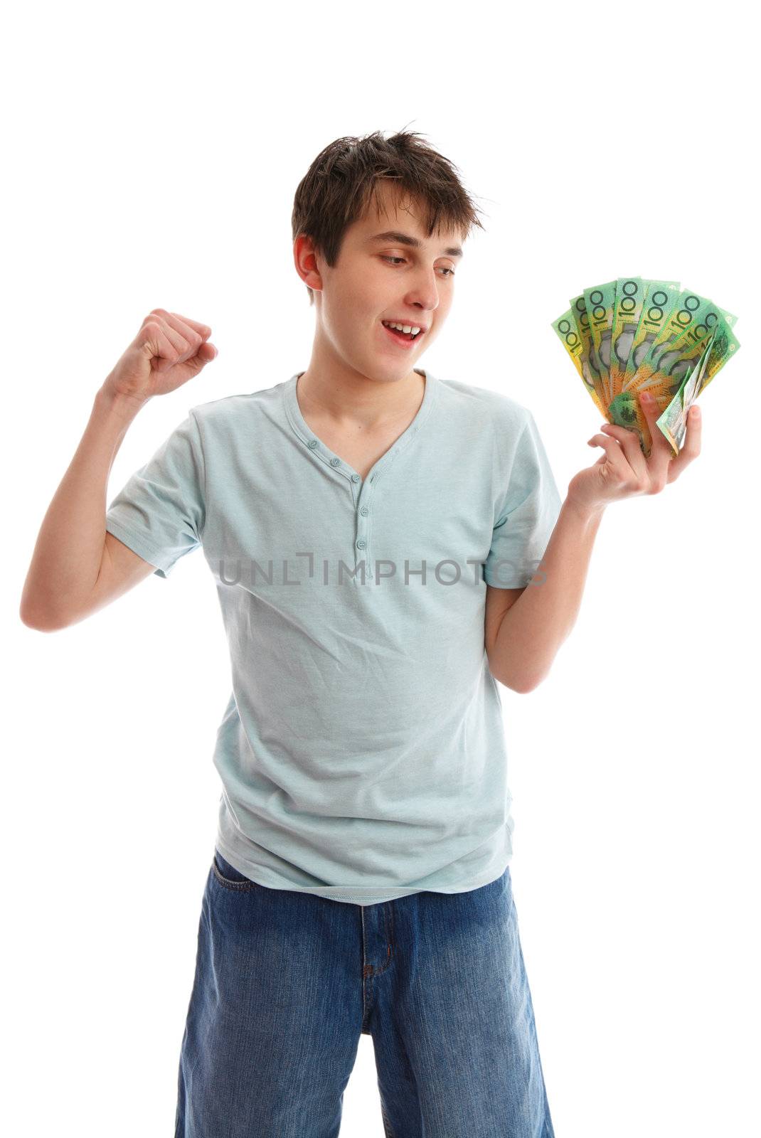 Teenager with a handful of cash banknotes and making a fist