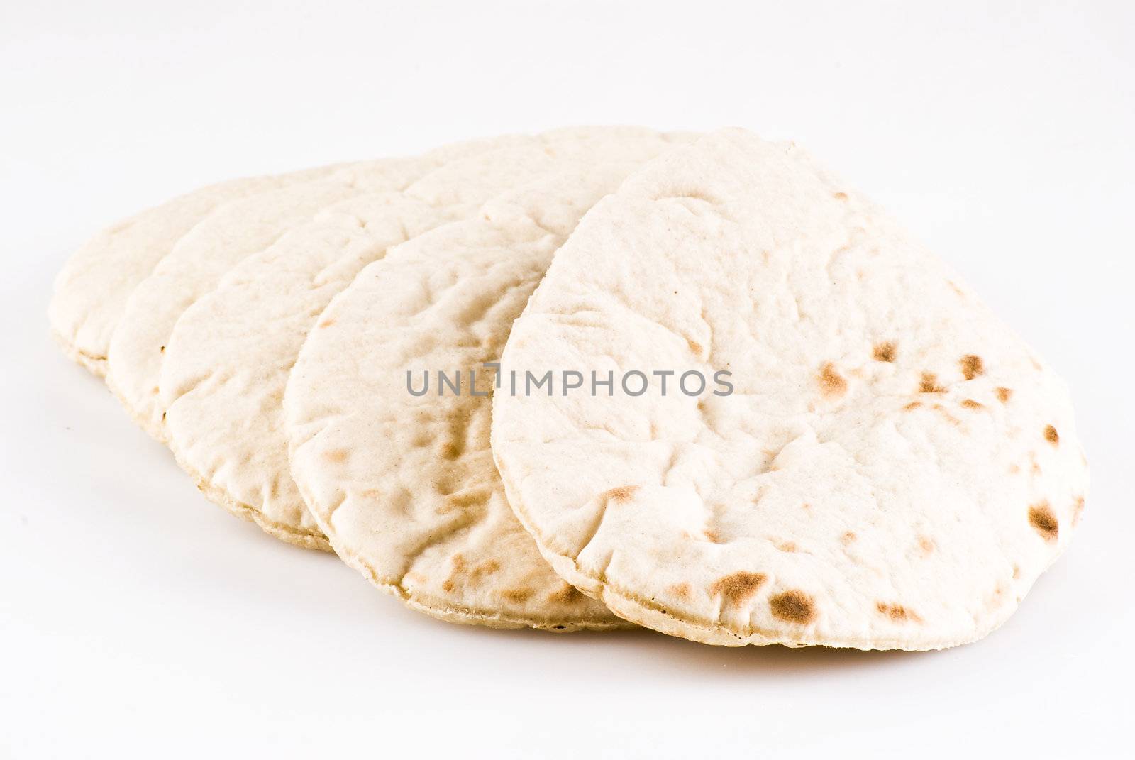 Pitta bread isolated over white background