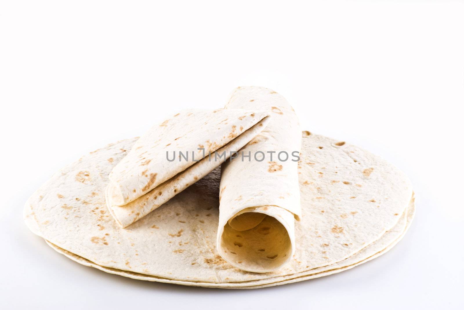 Stack of tortillas with two on the top - isolated