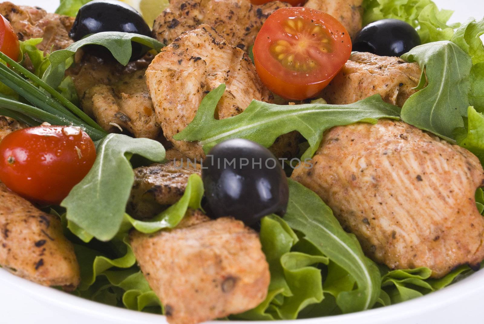 Closeup of freshly made chicken and vegetable salad