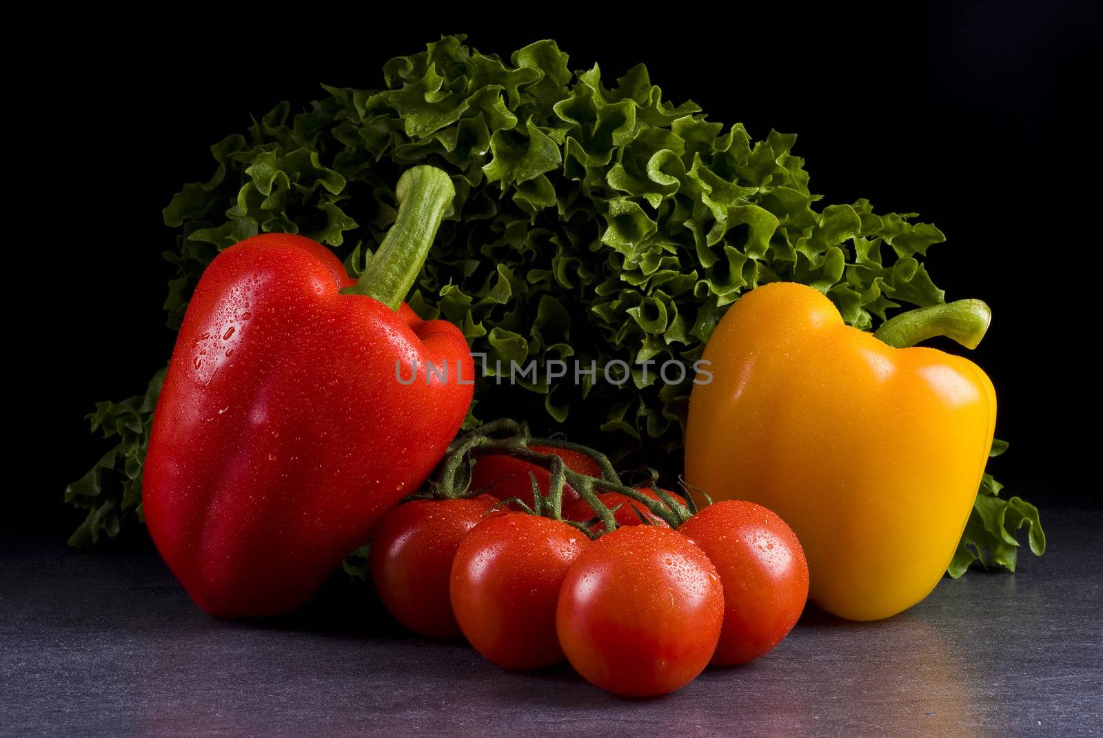 Fresh vegetables on a black background