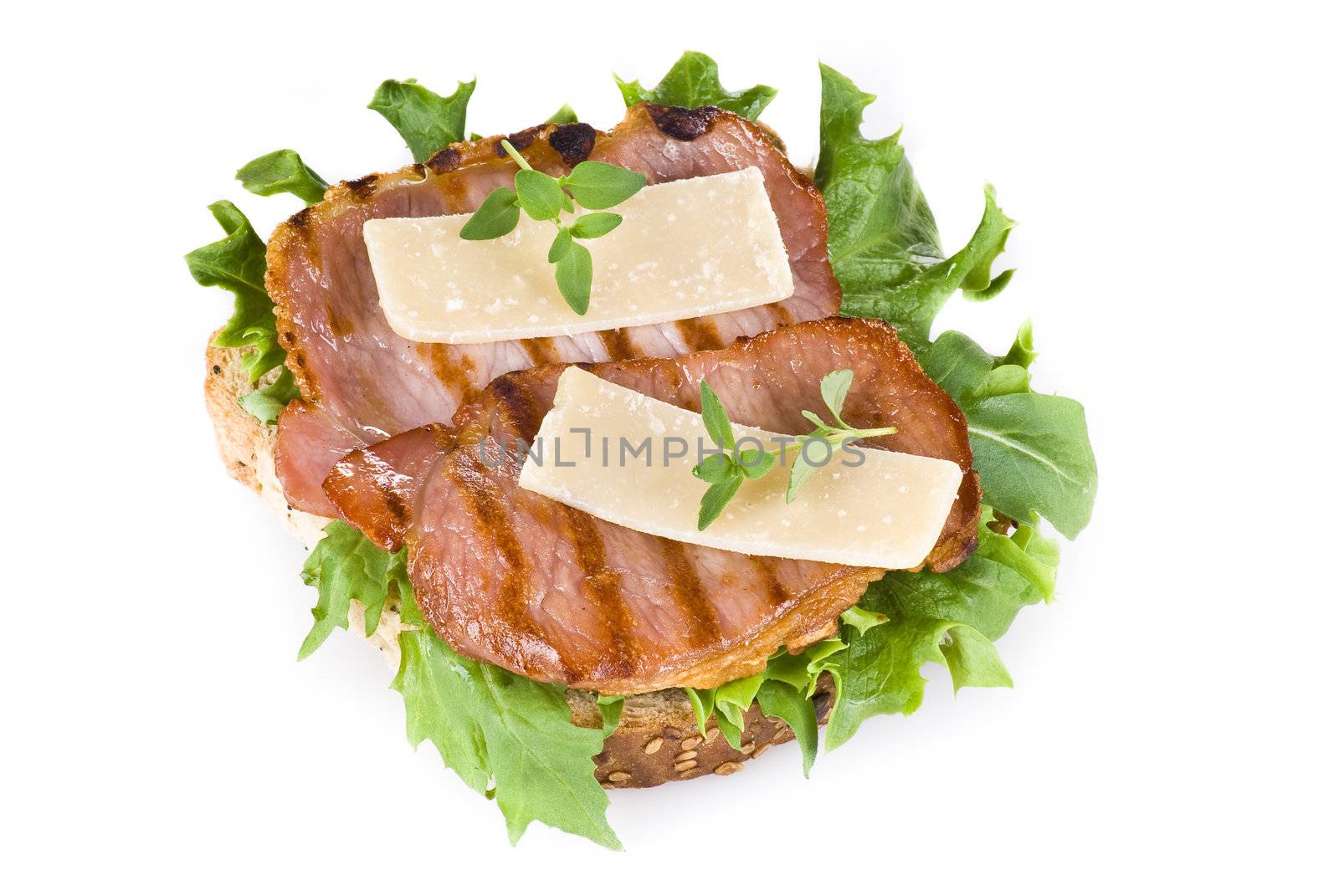 Freshly made bacon sandwich isolated over white background