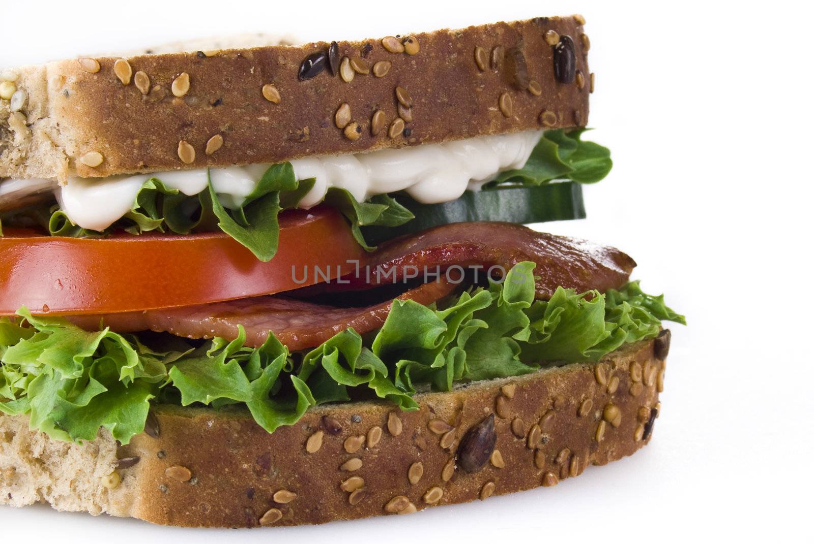 Freshly made bacon sandwich isolated over white background