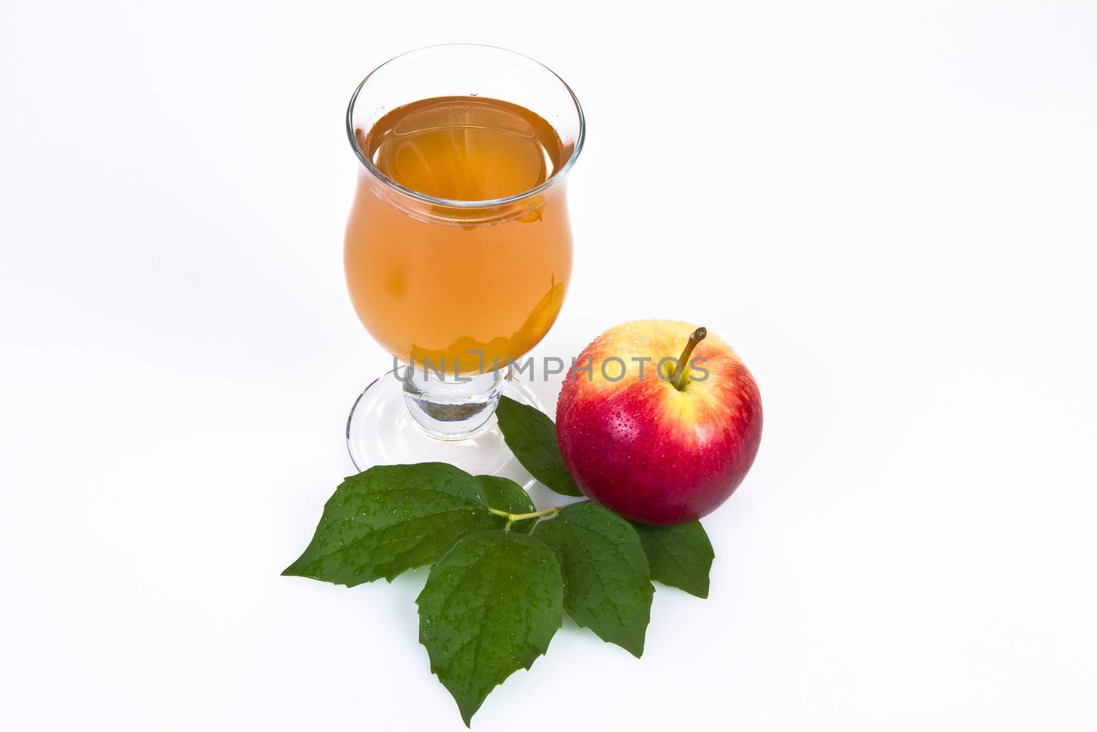 Apple juice with apple fruit isolated over white background
