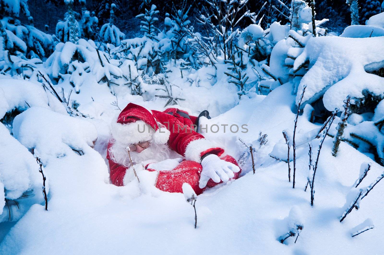 Santa struggling to deliver presents. He seems stuck in deep snow
