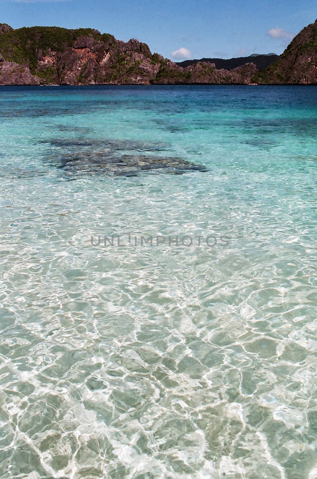 Seascape of tropical island, clear and turquoise water in philippines