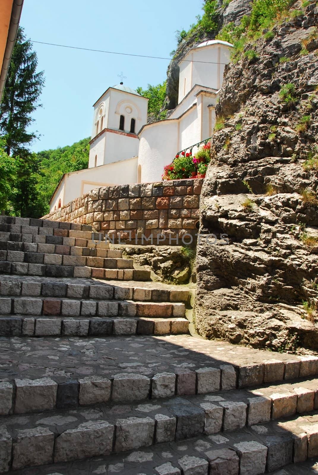 old orthodox Gornjak Monstery in Serbia, stone stairs and church exterior