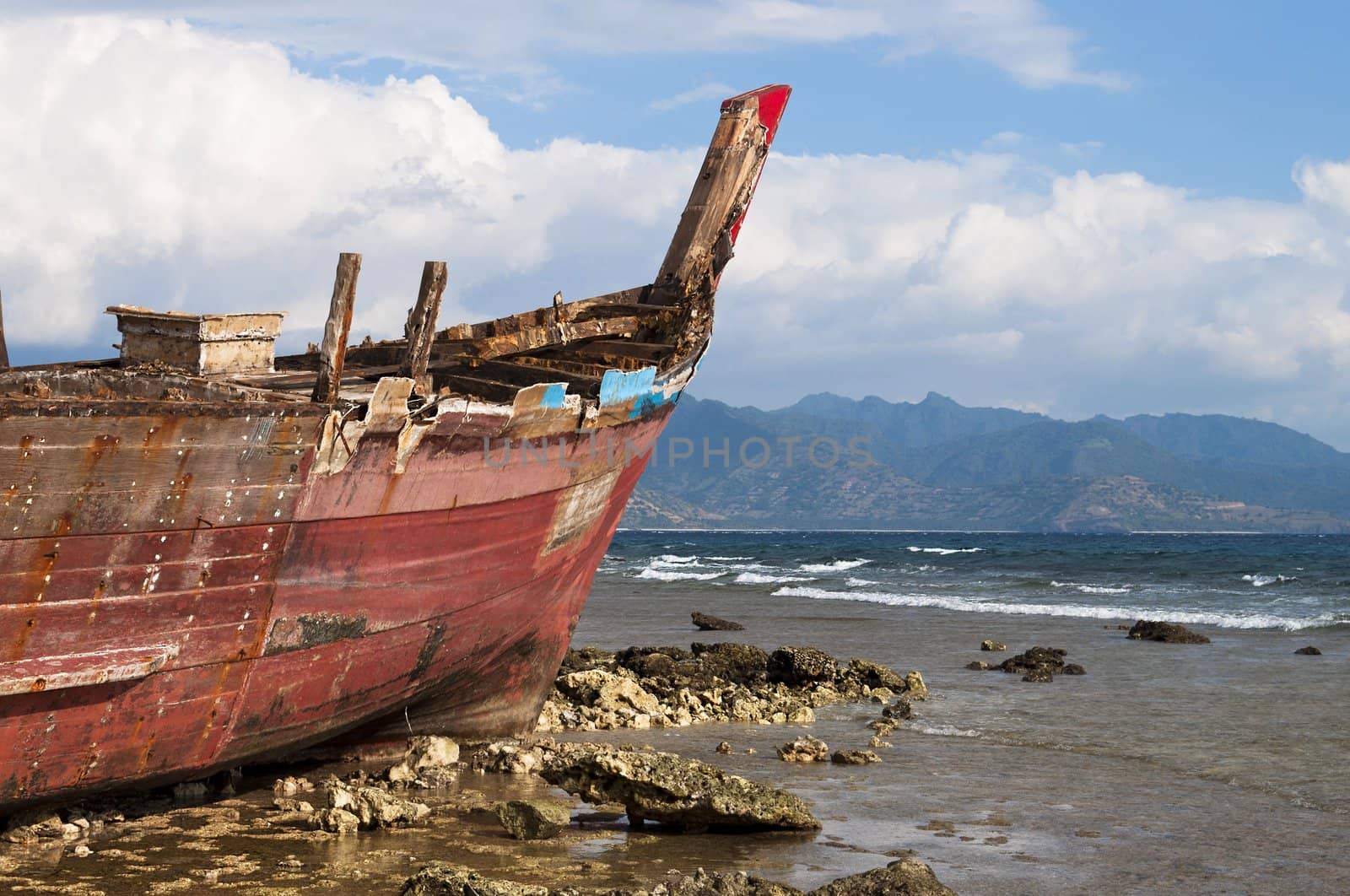 Shipwreck in shoreline by rigamondis