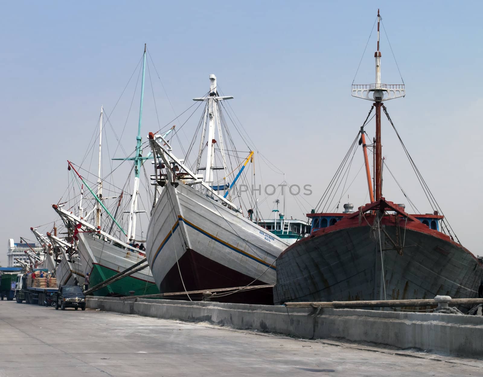 Old transport ships in Jakarta harbor Indonesia