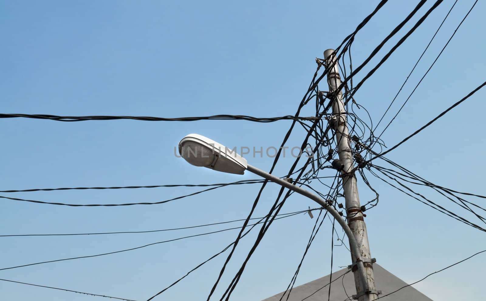 Streetlight pole with cables by rigamondis