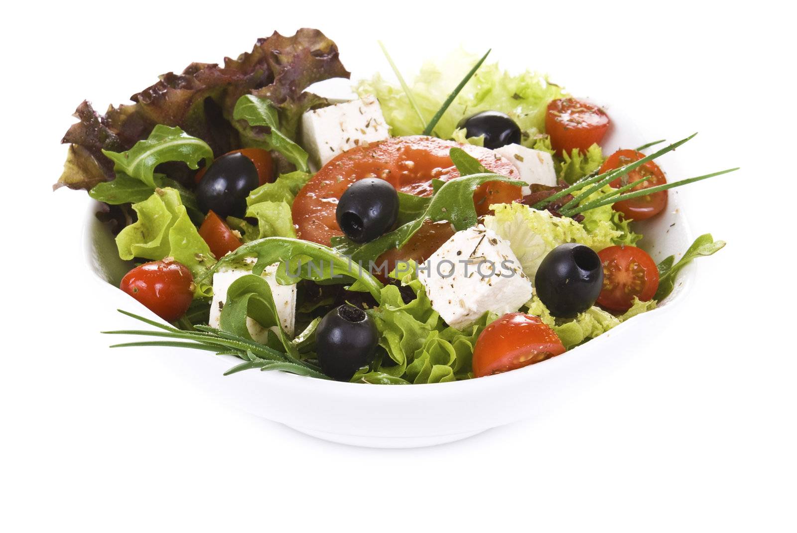 Fresh vegetable salad isolated on white background