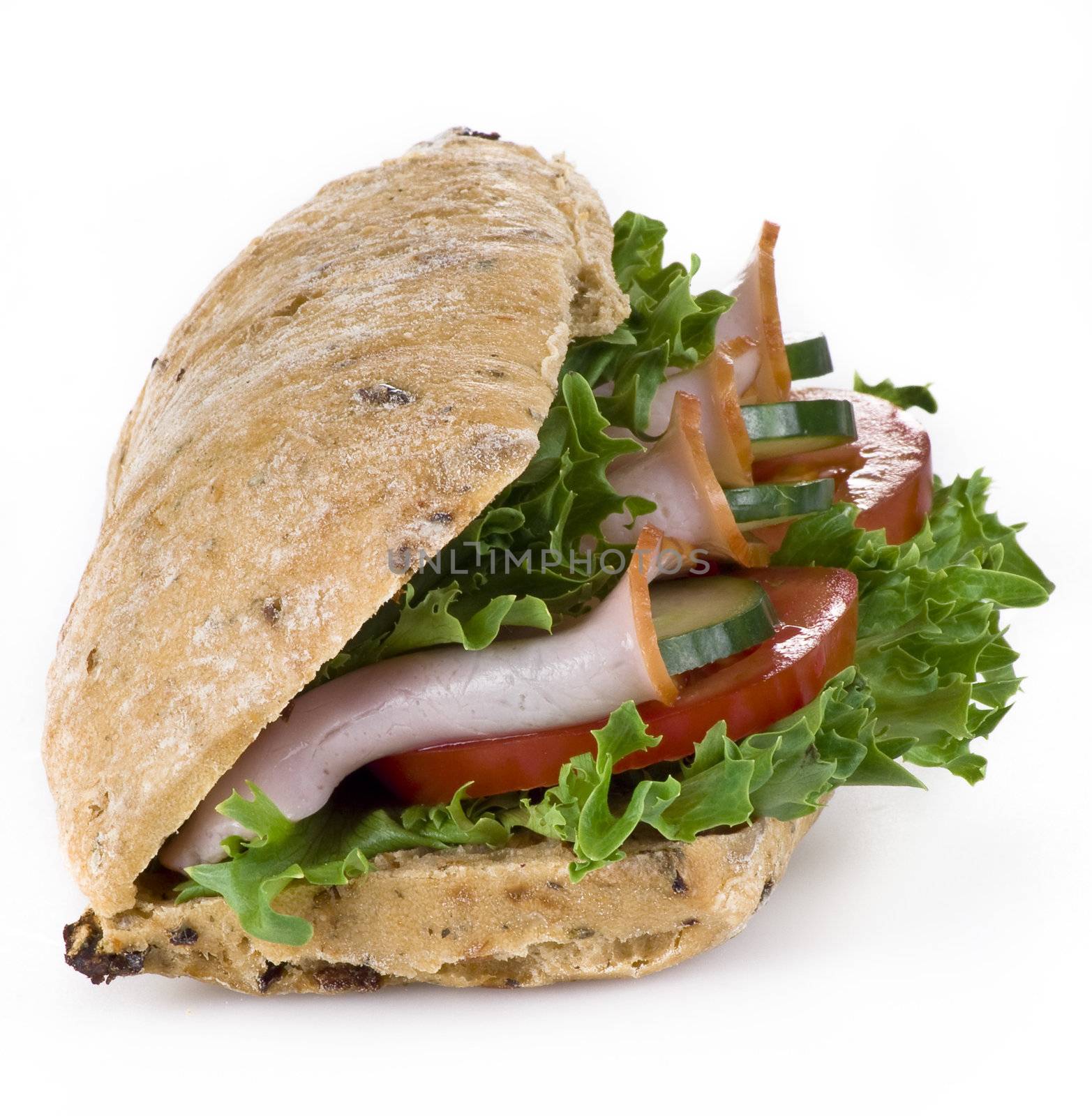 Freshly made ham and vegetable sandwich - isolated