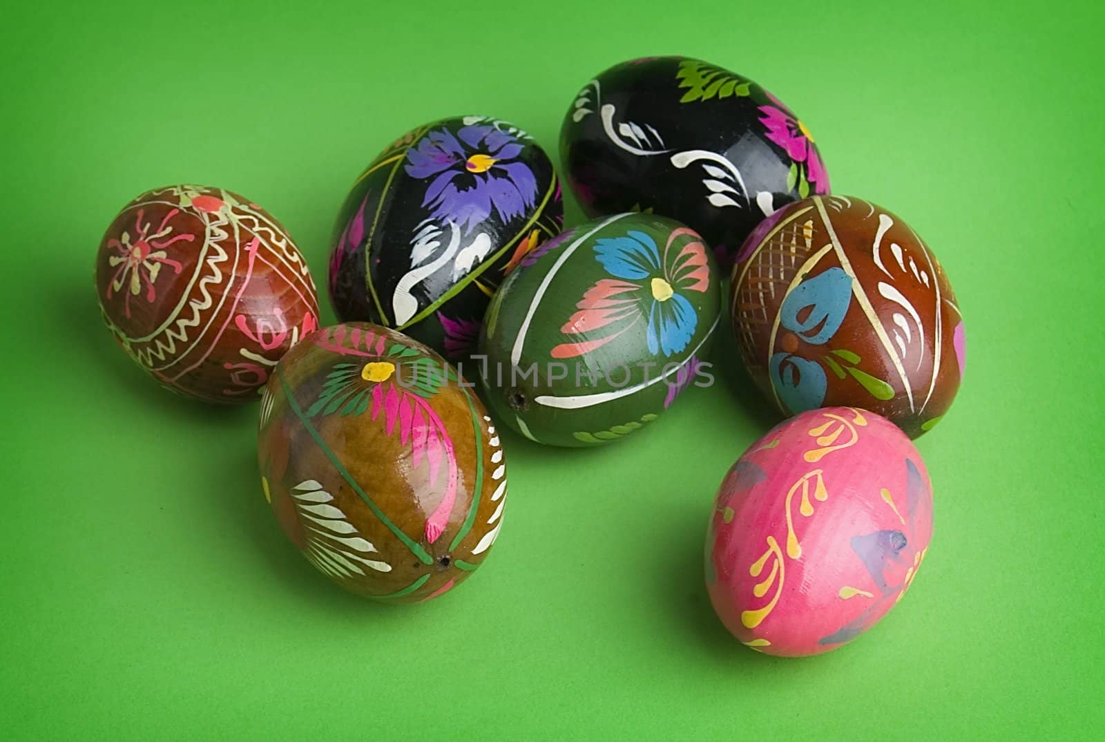 Spring easter eggs over green background.