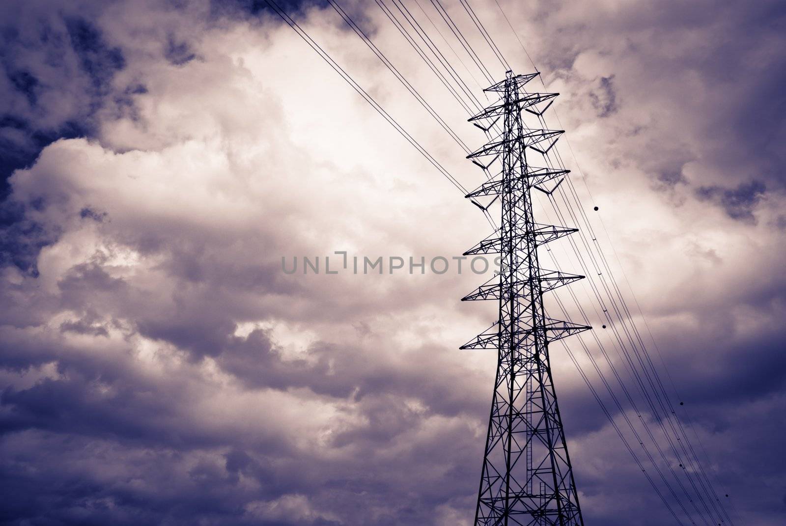 High power electrical pole on a cloudy day with silhouette
 by sasilsolutions