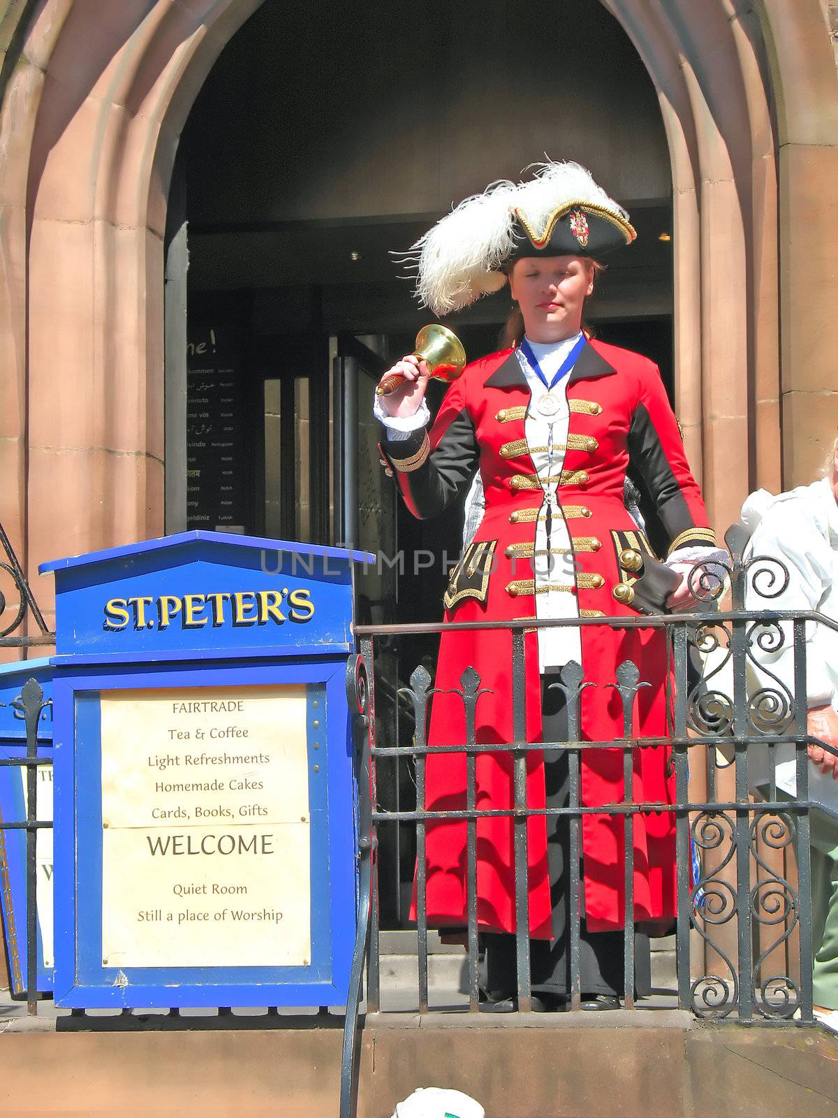 Town Crier Ringing Bell in Chester England UK