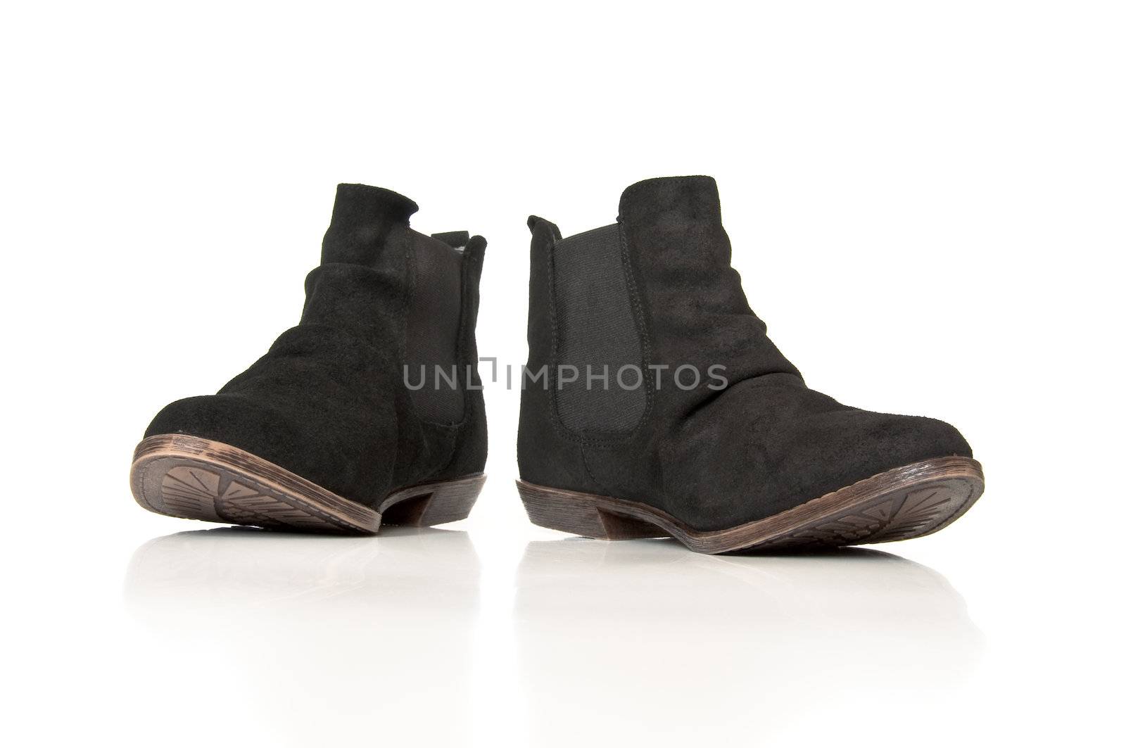 Black leathers boots on a white background