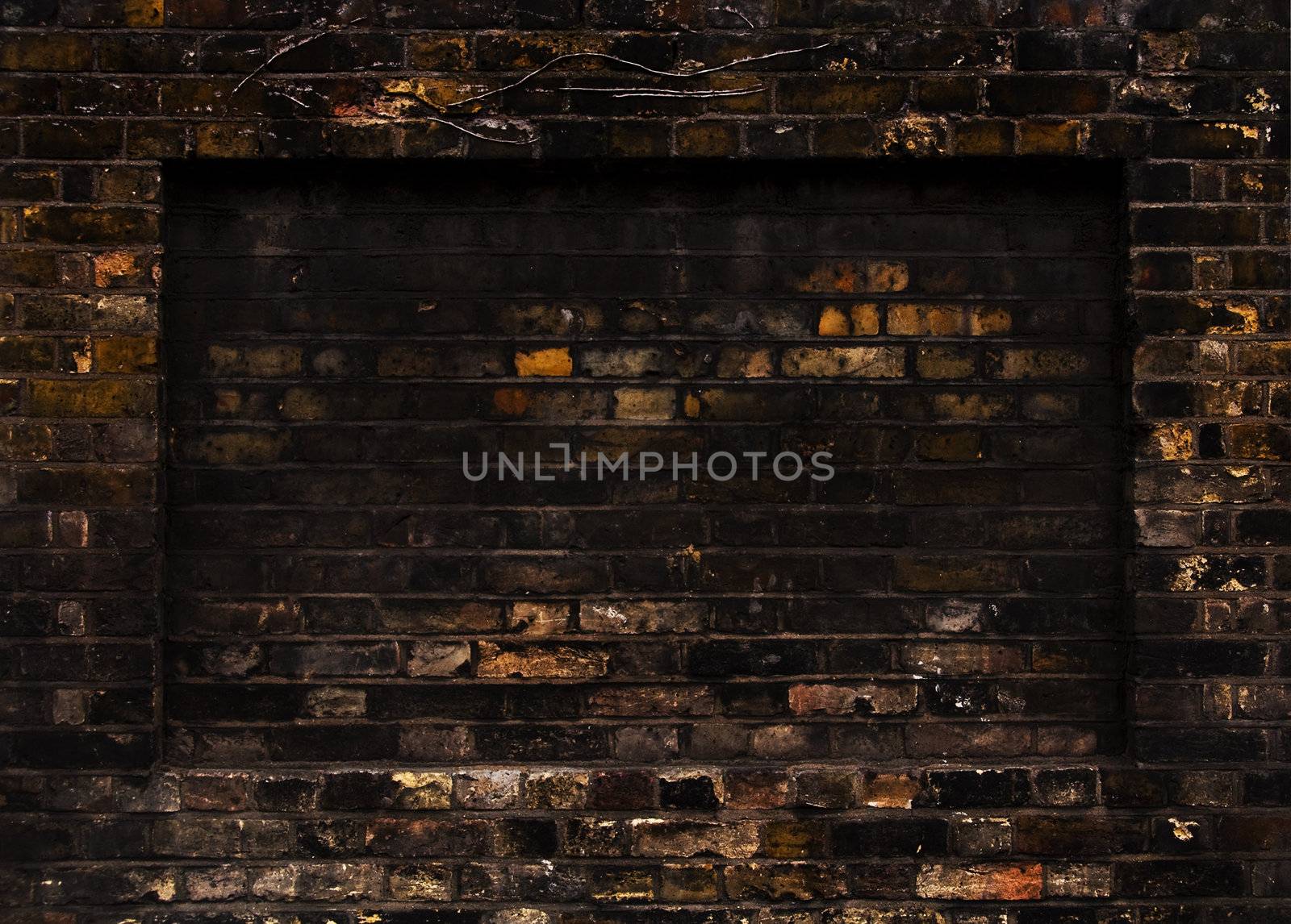 Old weathered brick wall, rectangular recess