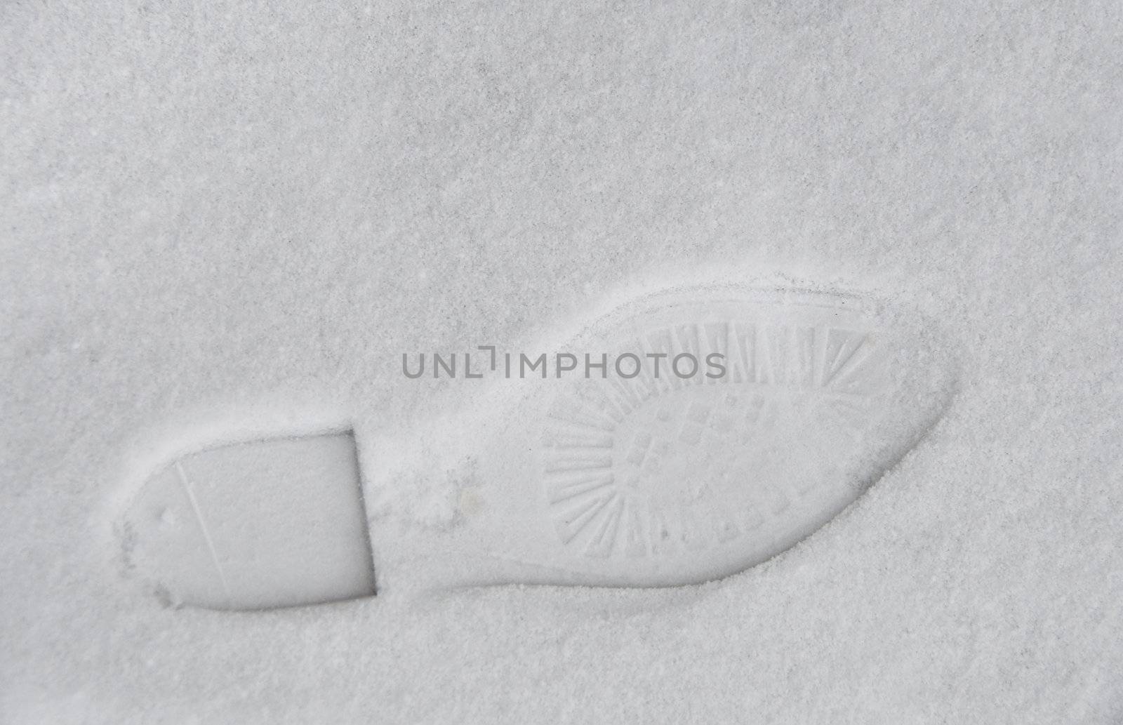 Footprint in the snow by dutourdumonde